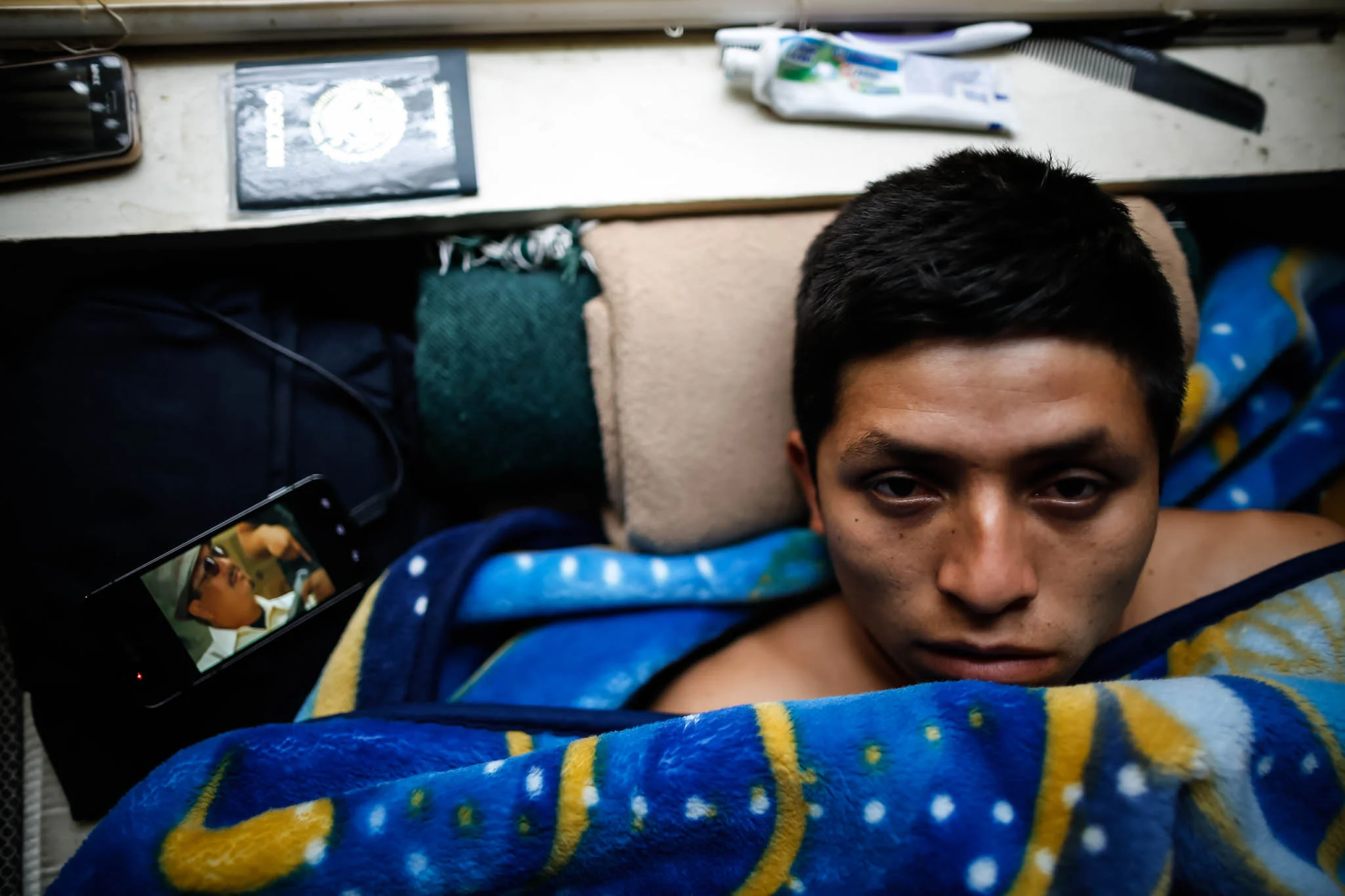 Isael Cortes, a 20-year old migrant worker from Mexico, works at the Mucci tobacco farm in Midway, Kentucky. When asked about his motivations to work in the United States, he said, "It's hard work, but I have a wife and a one year old daughter back home and I can make more money here." Mexican laborers can purchase 6 month US work visas in Mexico for 1,100 pesos.