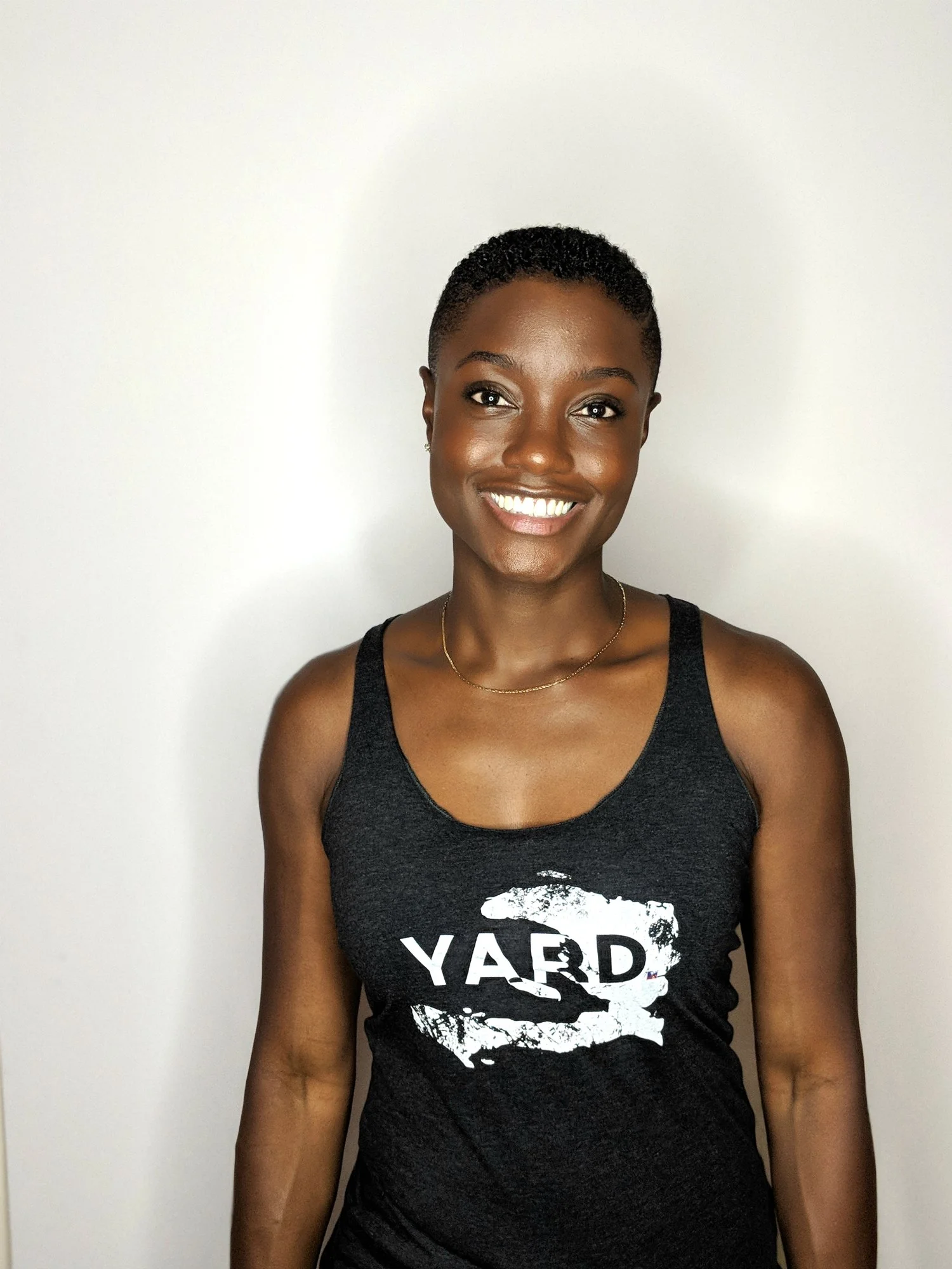 haiti_womens_tank_charcoal_modelled.jpg