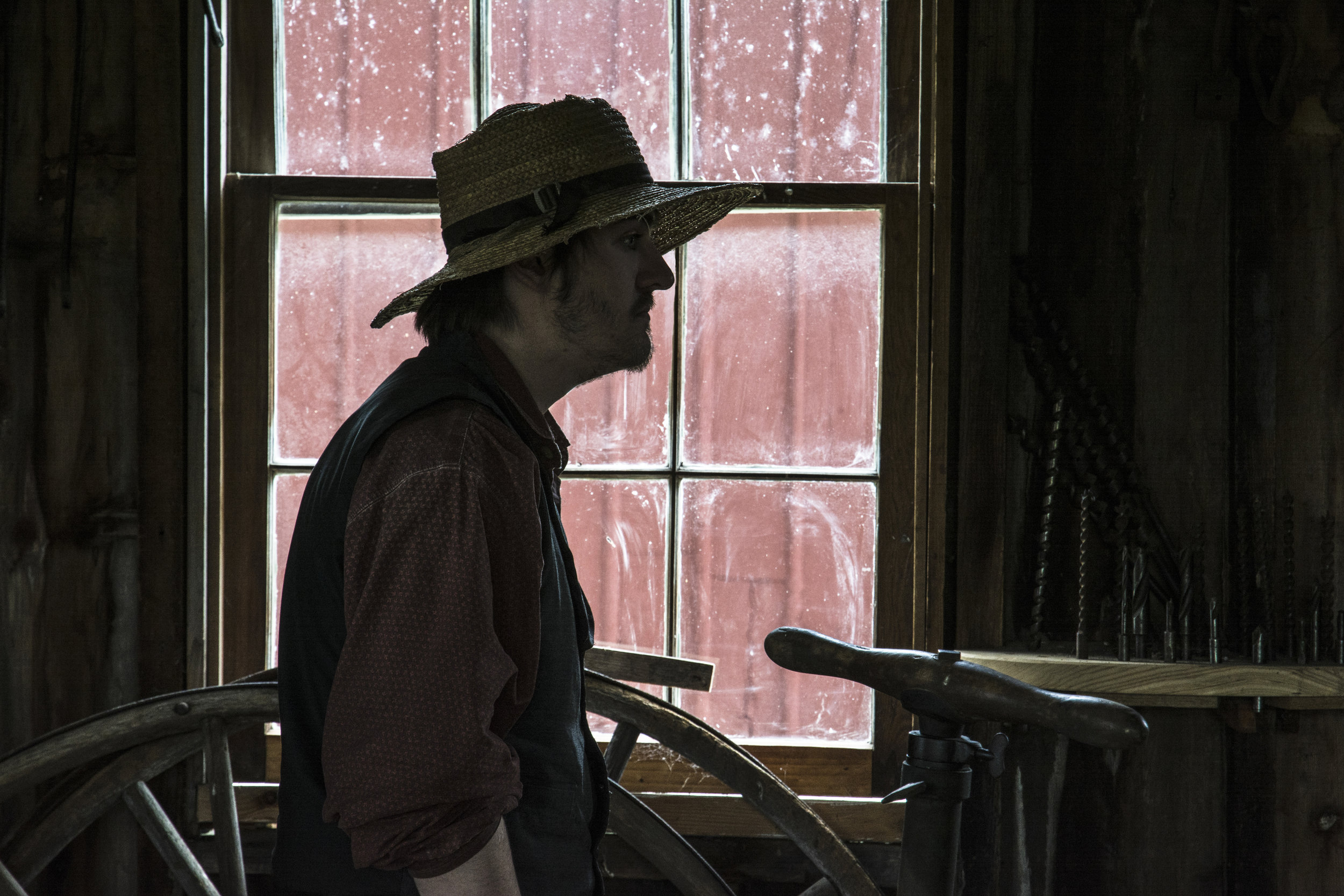 Carpenter in profile in his shop 2 Old World.jpg