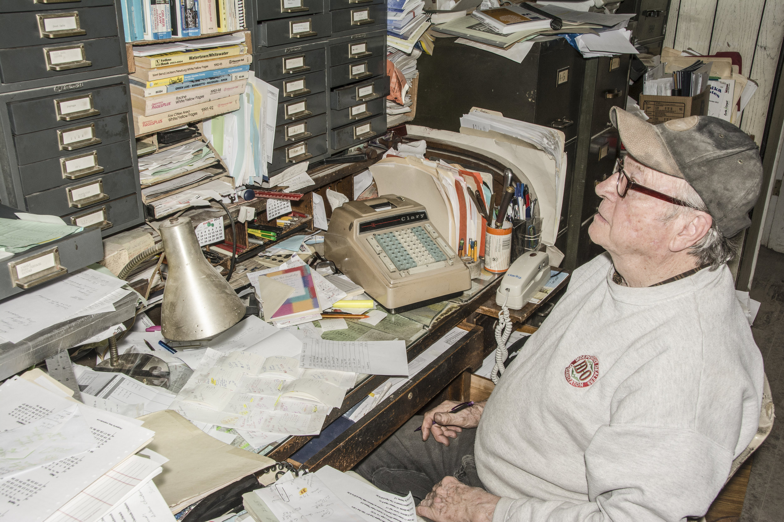 The Peachy family has been in the grain elevator business for 132 years in Burnett, Wisconsin. Don Peachy carries on the family business. Key to his success? Knowing his customers and knowing where everything is in his office. 