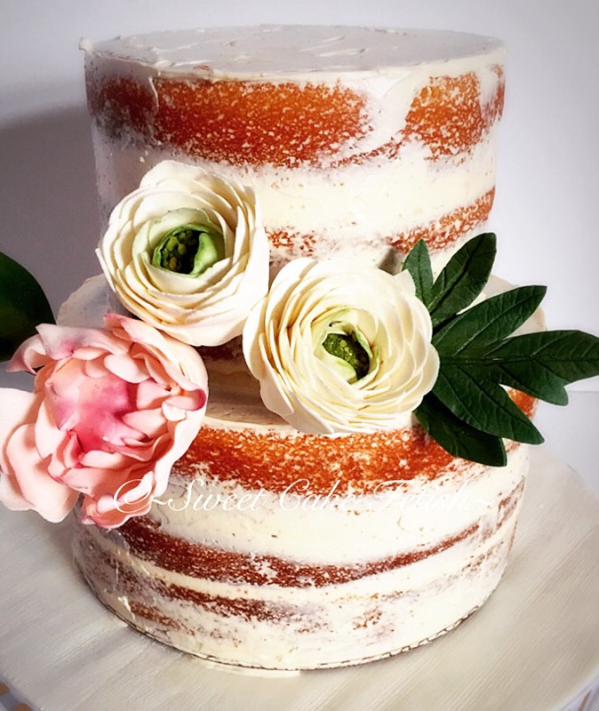 We had the pleasure in making this elegant, yet stunning naked cake for a special young ladys' 18th Birthday! Naked cakes are certainly one of our favorite cakes. The simplicity and elegance are just so organic. We adorned this cake with handmade sugar flowers chosen by the birthday girl! 