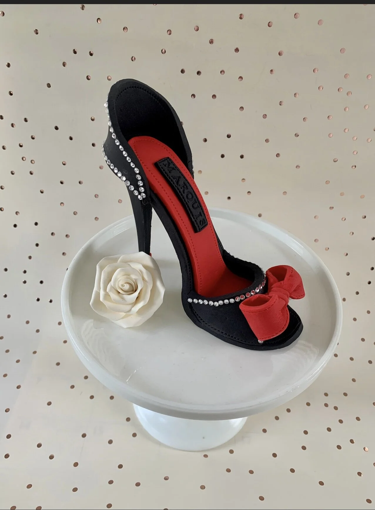 This is a handmade Black & Red high heel shoe made from gumpaste and non-edible rhinestones to be used as a cake topper. Good for any Birthday, Bridal and Wedding Custom Cakes at any Celebration