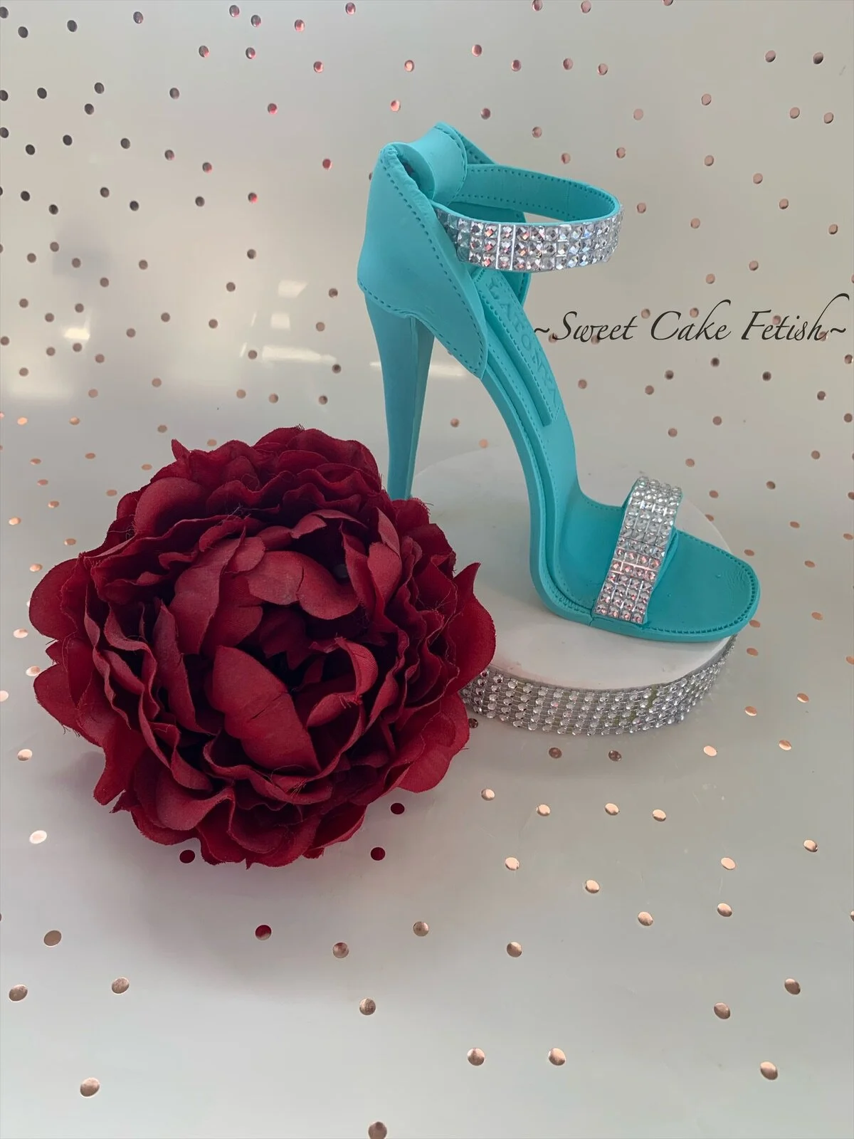 This is a handmade Turquoise high heel shoe made from gumpaste and non-edible rhinestones to be used as a cake topper. Good for any Birthday, Bridal and Wedding Custom Cakes at any Celebration