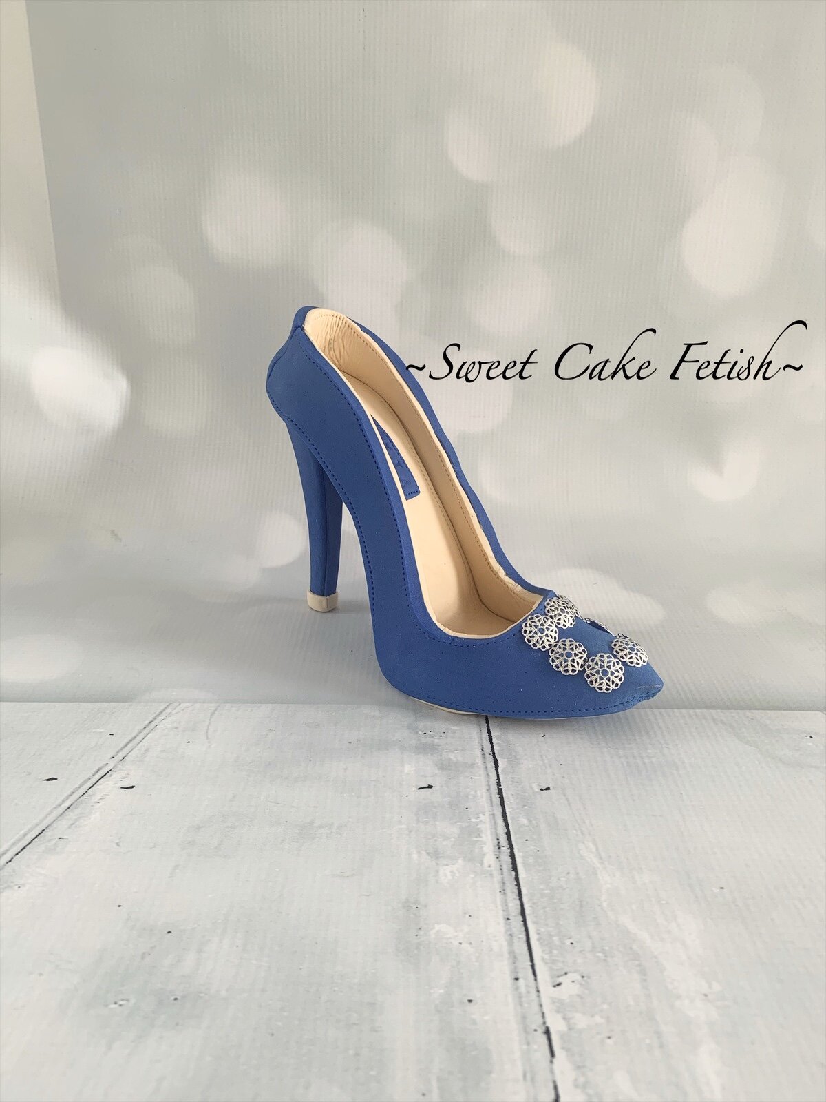 This is a handmade Blue & Beige high heel shoe made from gumpaste and non-edible rhinestones to be used as a cake topper. Good for any Birthday, Bridal and Wedding Custom Cakes at any Celebration