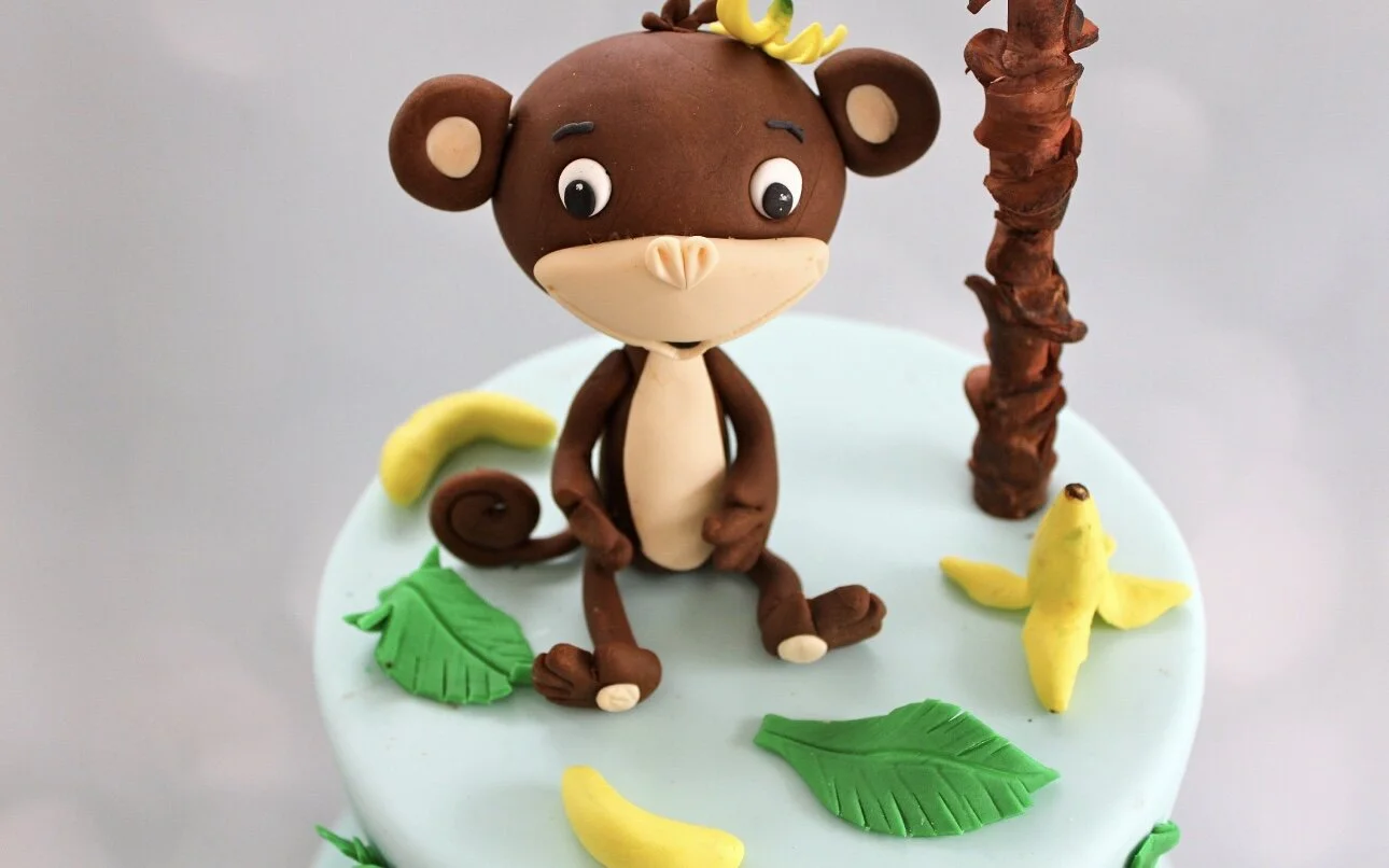 This is a handmade baby Monkey made from gumpaste to used as a cake topper. Good for Farm Custom cakes or custom cupcakes