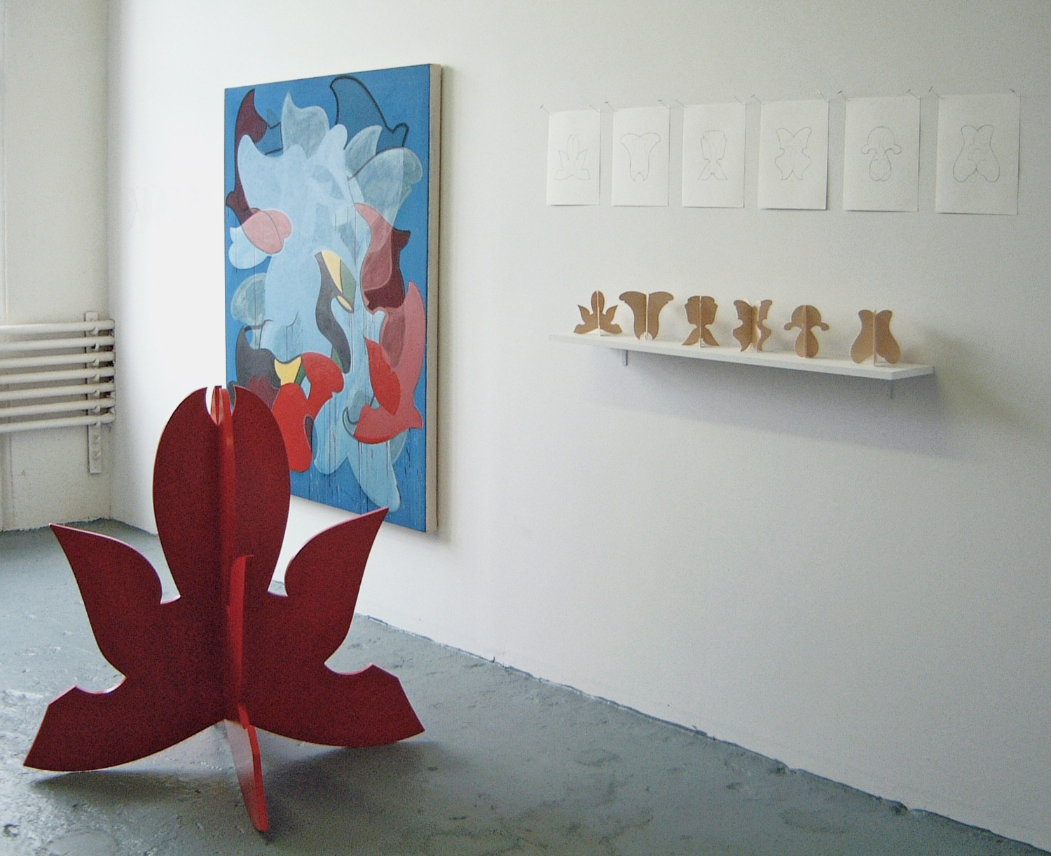 DUMBO studio installation of Untitled painting, which generated forms for Red Sculpture, Hannah Curves, Balsa Models and Model Drawings.