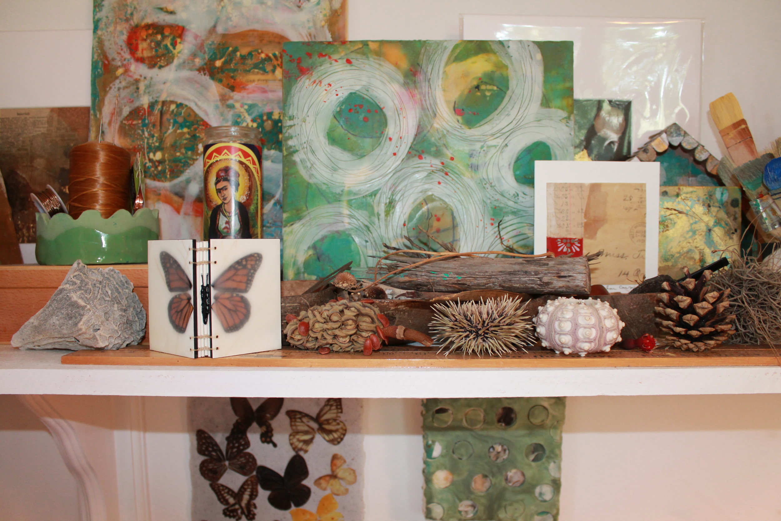  That beautiful hand-bound butterfly journal is by artist  Erin Keane  