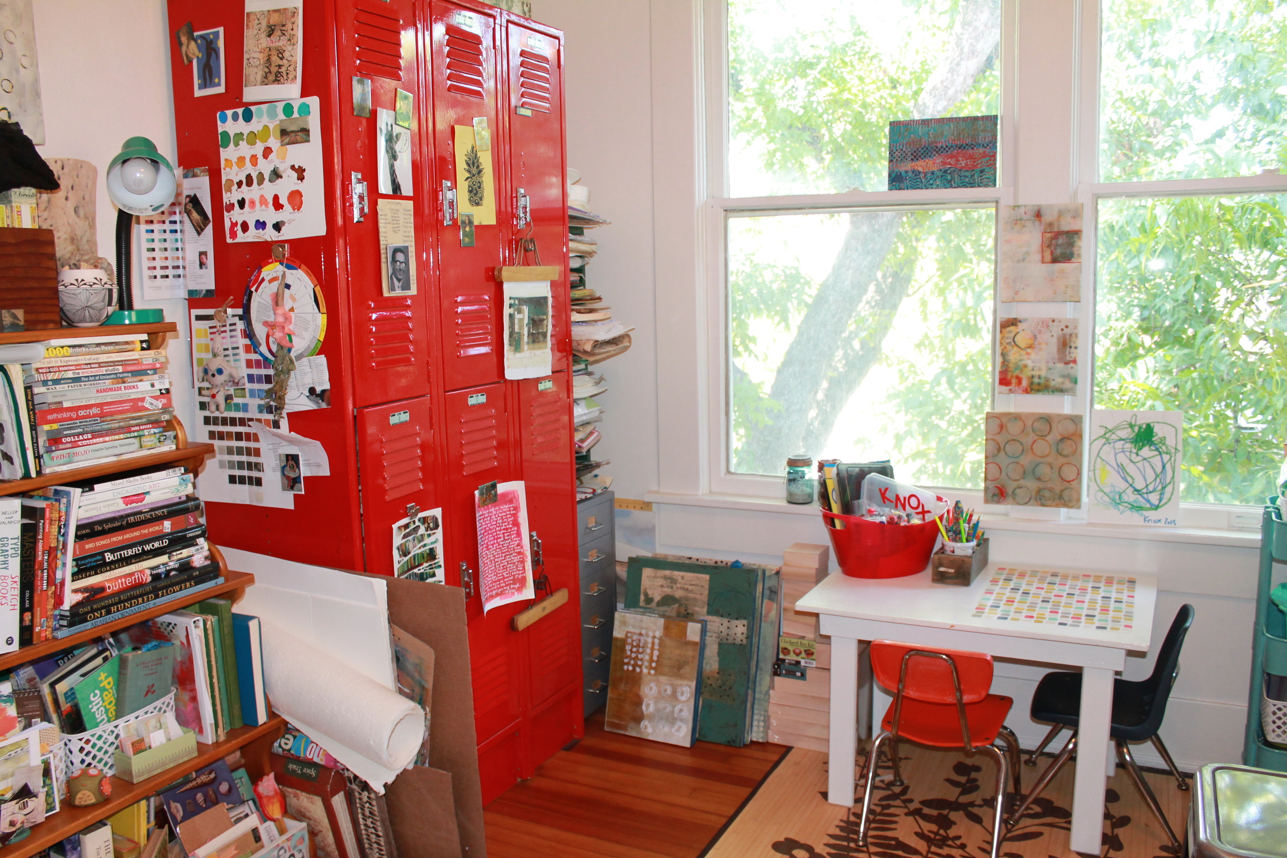  I got the lockers free from my Uncle and painted them red. My Dad fitted them with wood shelves. They hold A TON of stuff. 