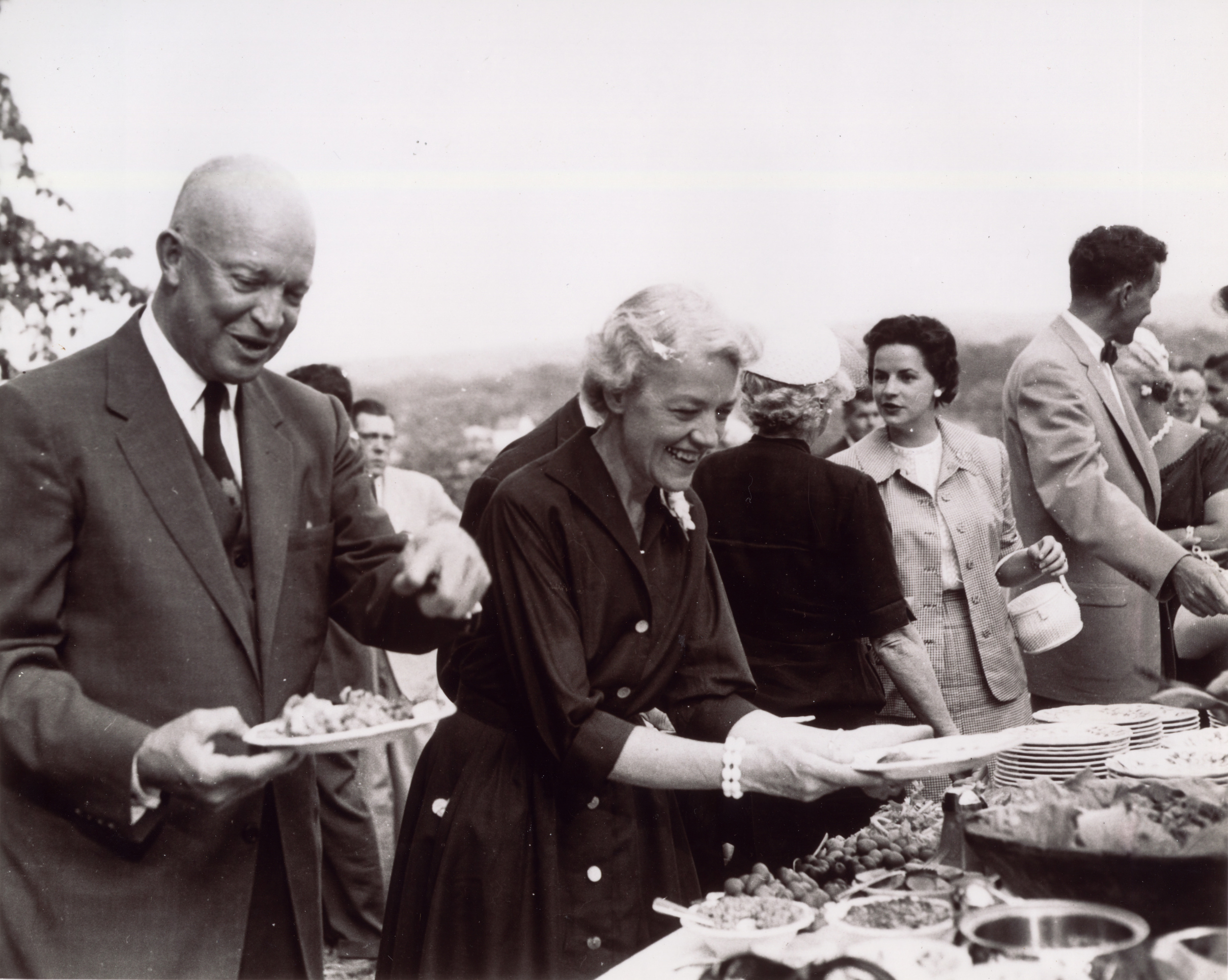 1955: Hosts President Dwight D. Eisenhower at her home during his visit to Skowhegan, Maine.