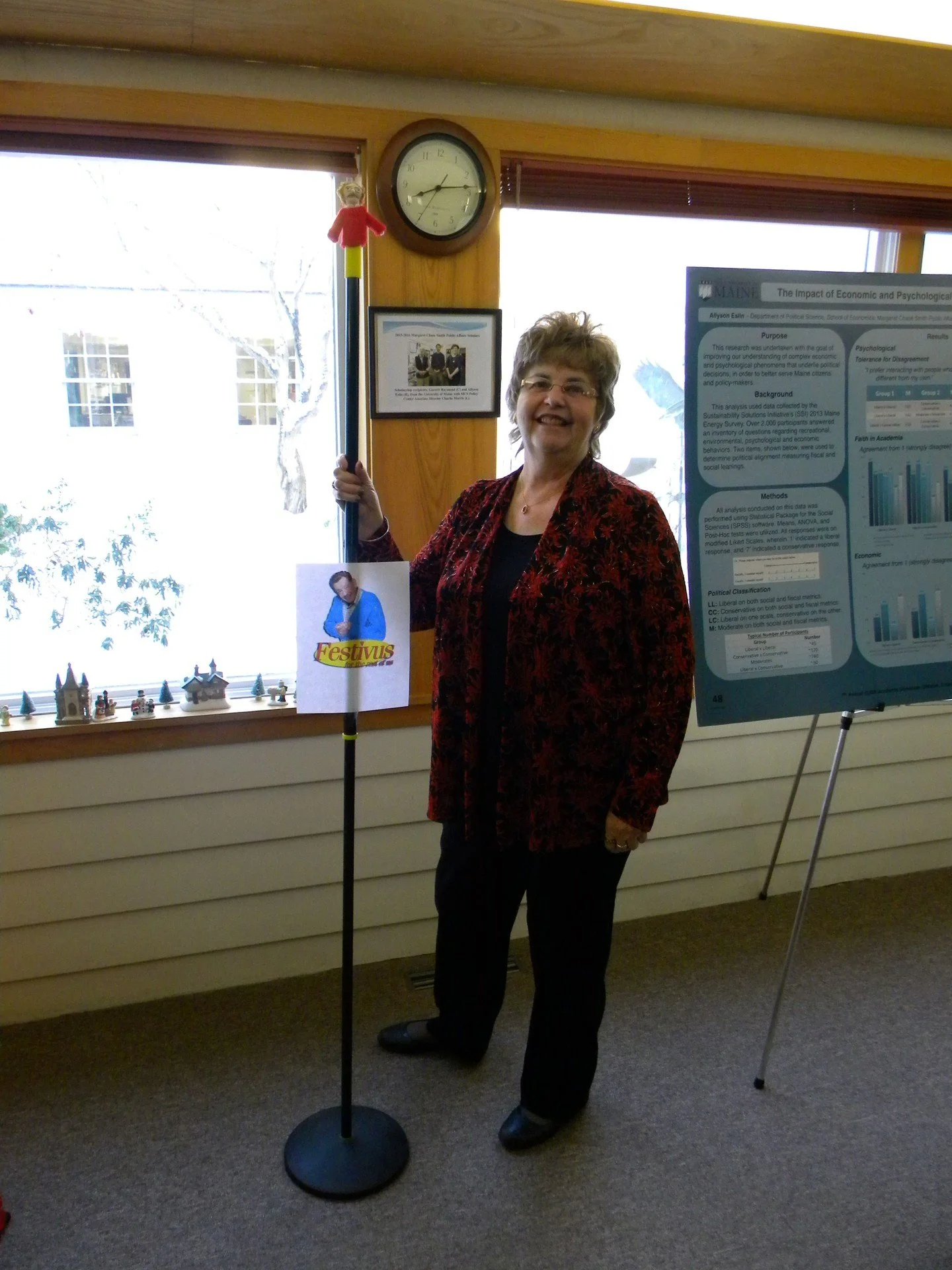 Happy Festivus, one and all! Former staffer Angie Stockwell posed next to the Festivus decoration placed by John Taylor during the staff holiday party in the year 2016. 
#FestivusForTheRestOfUs
