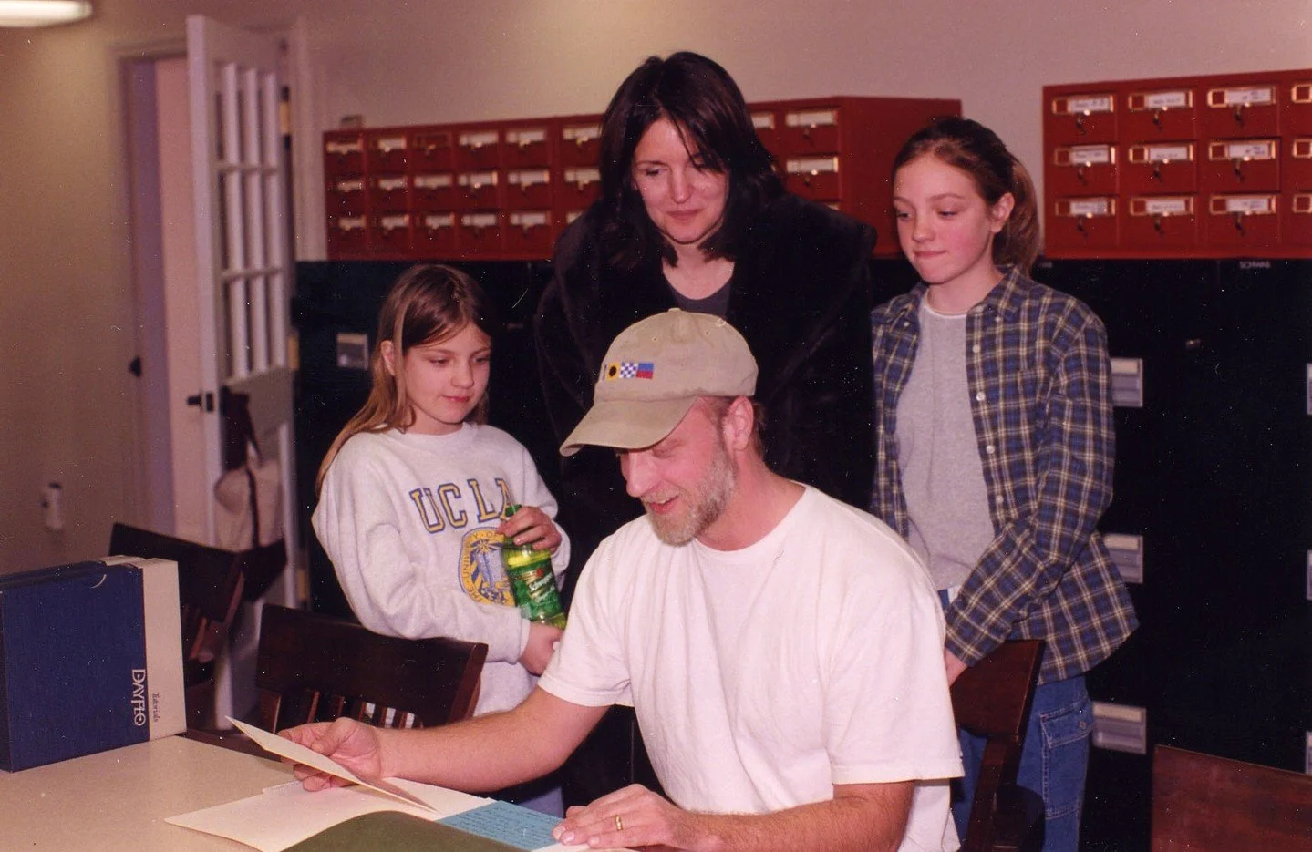 #OTD in 1999, comedian Chris Elliott visited the Library with his wife Paula and daughters Birdie and Abby. The family purchased a home on Cundy's Harbor where the Senator had a summer house and stopped by to do a little research on the area. Both Ch