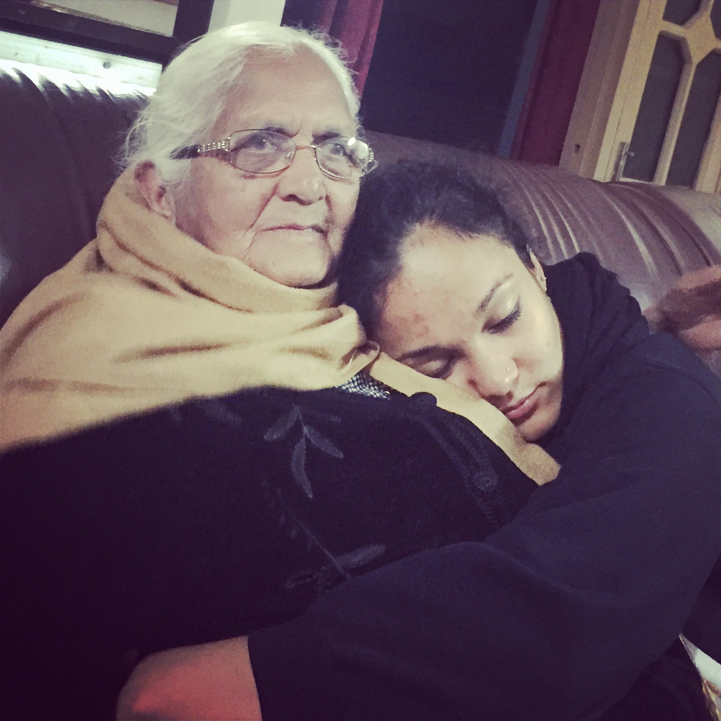 Cuddling my grandma in India.