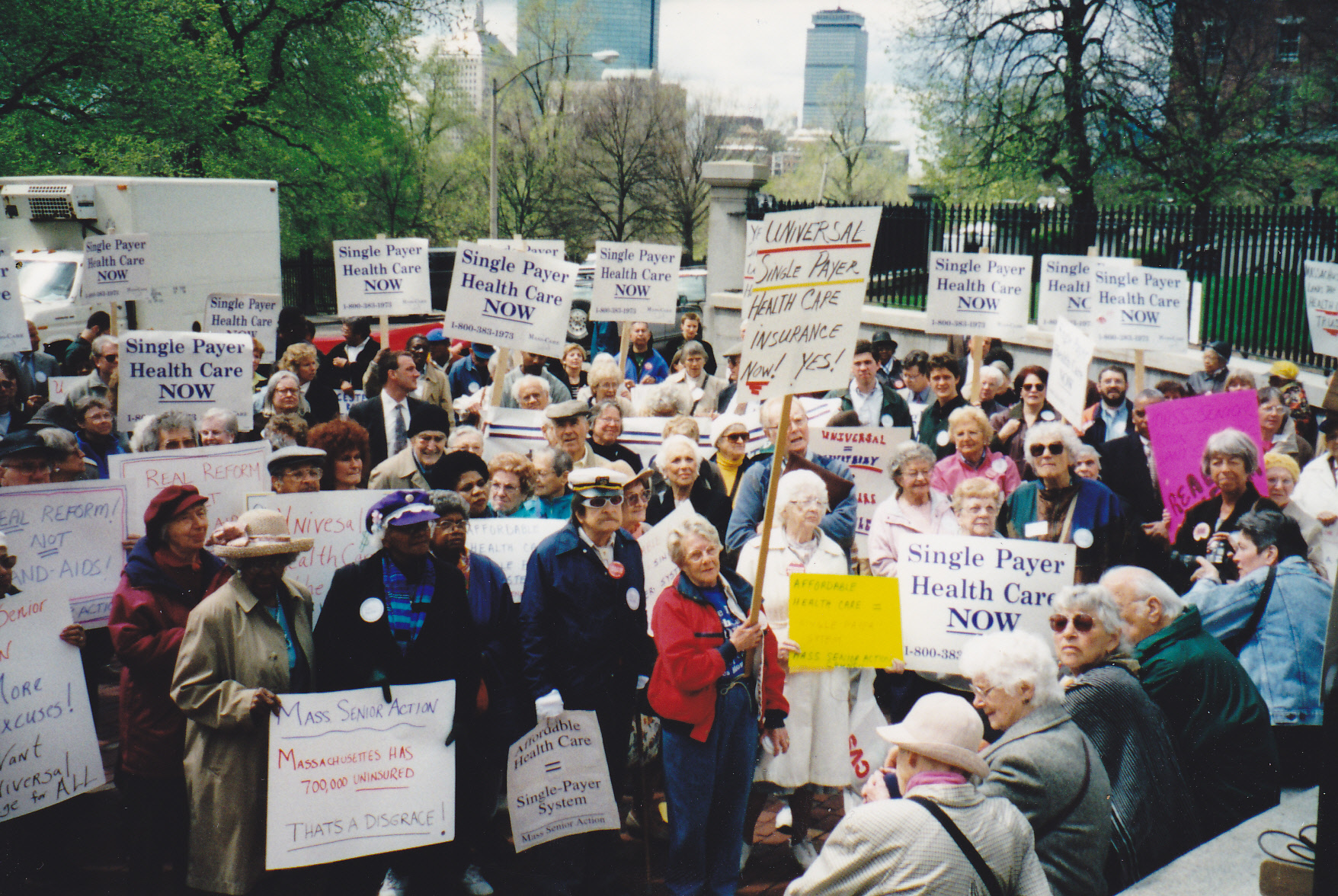 Group of people holding signs 