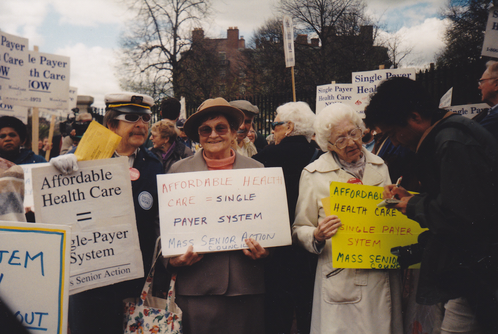 Seniors standing holding signs 