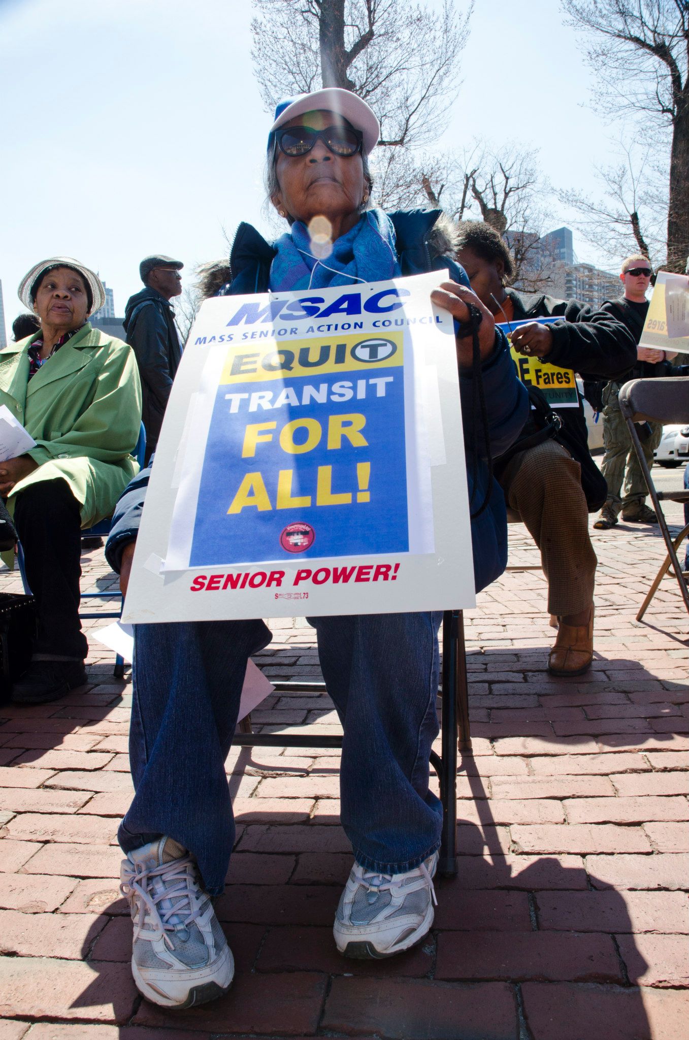 Senior holding transit for all sign