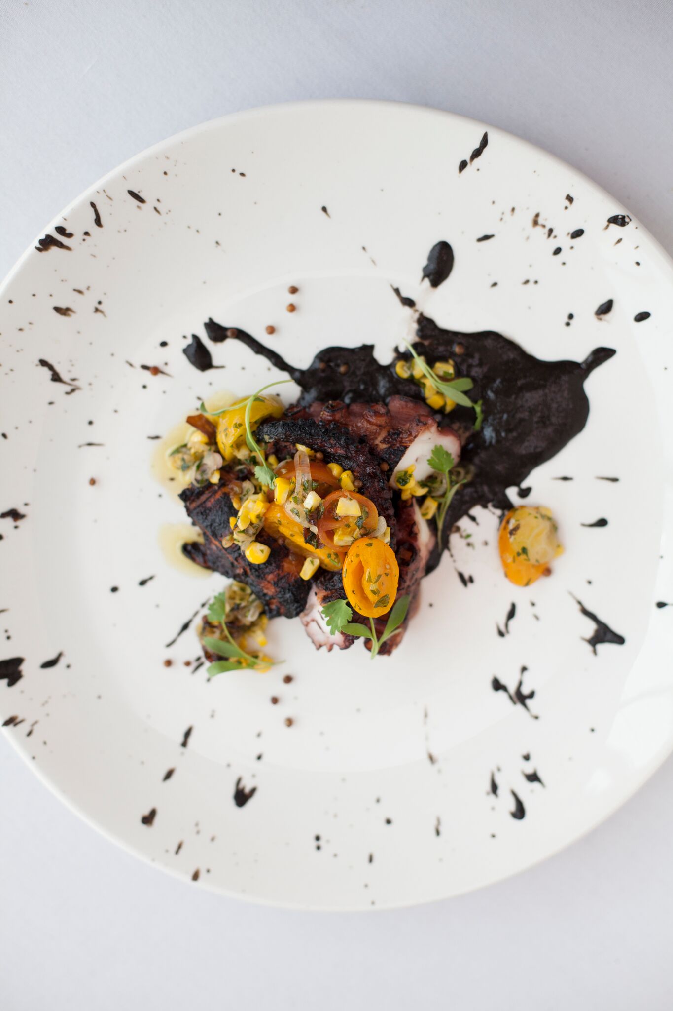 Citizen Kitchen's Grilled Spanish Octopus with "Mole Negro."