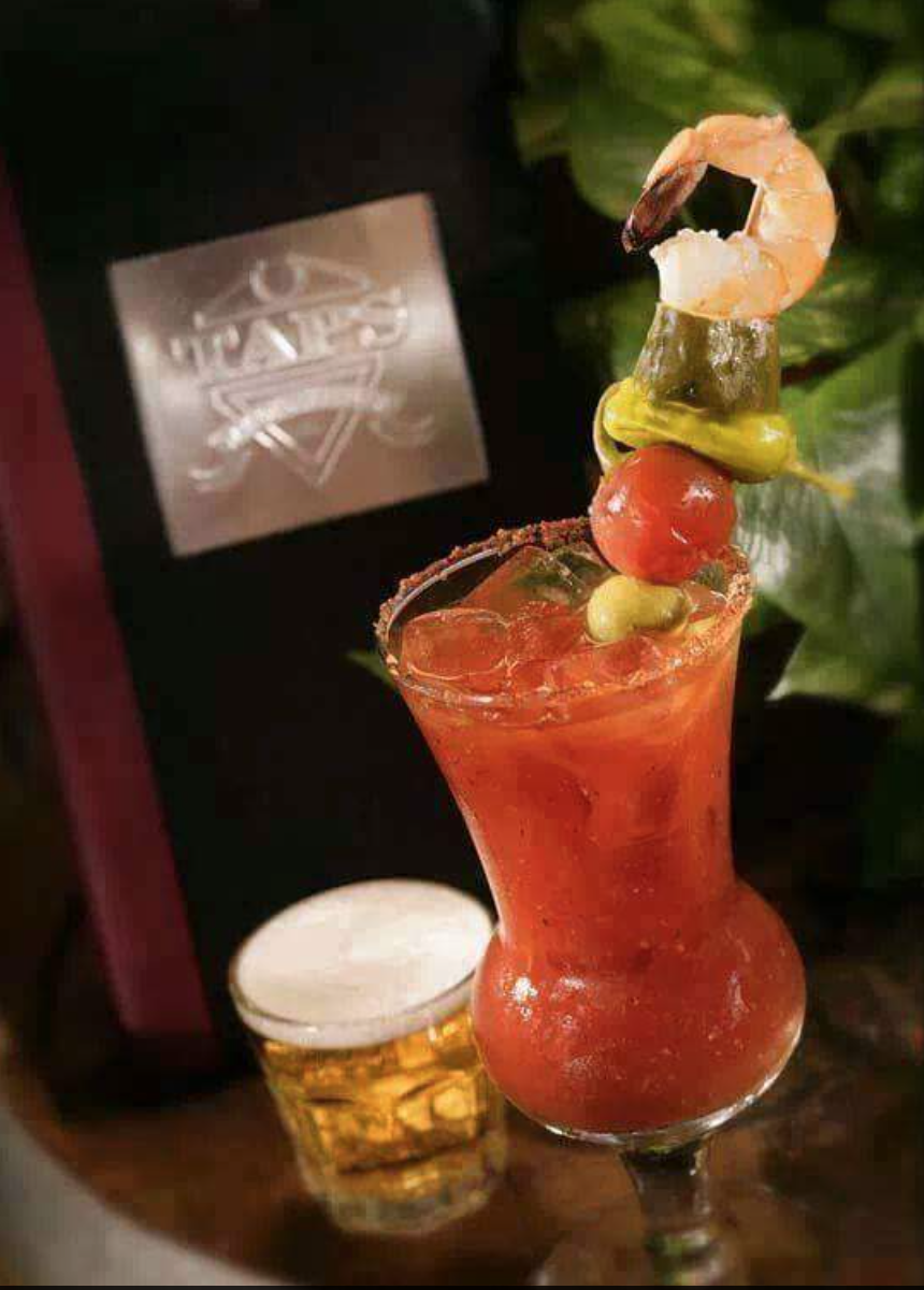 Taps' Bloody Mary and impressive garnish (or meal on a stick?) | Photo courtesy of Taps Fish House via Facebook