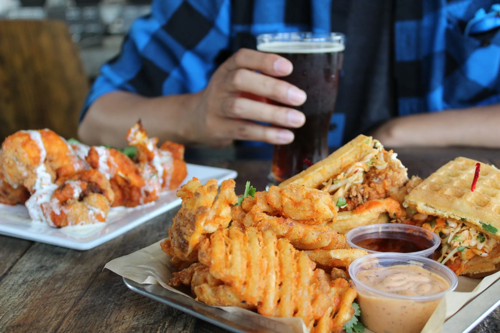 Bring man's best friend along to get down on waffles and beer on the patio at The Iron Press| photo courtesy of 100eats