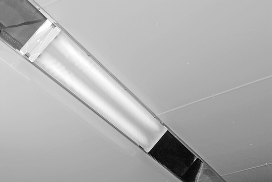 CORNER MOUNTED 4' FLOURESCENT LIGHTS