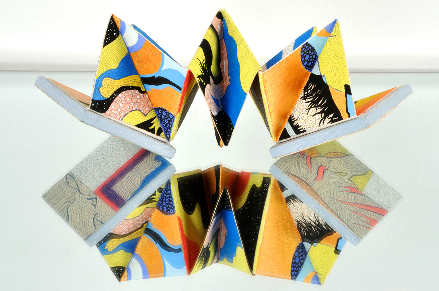   Microcosm Origami Accordion Book Sculpture II , Mixed media on paper &amp; wood, 8 in. x 5 in. x 5 in. 