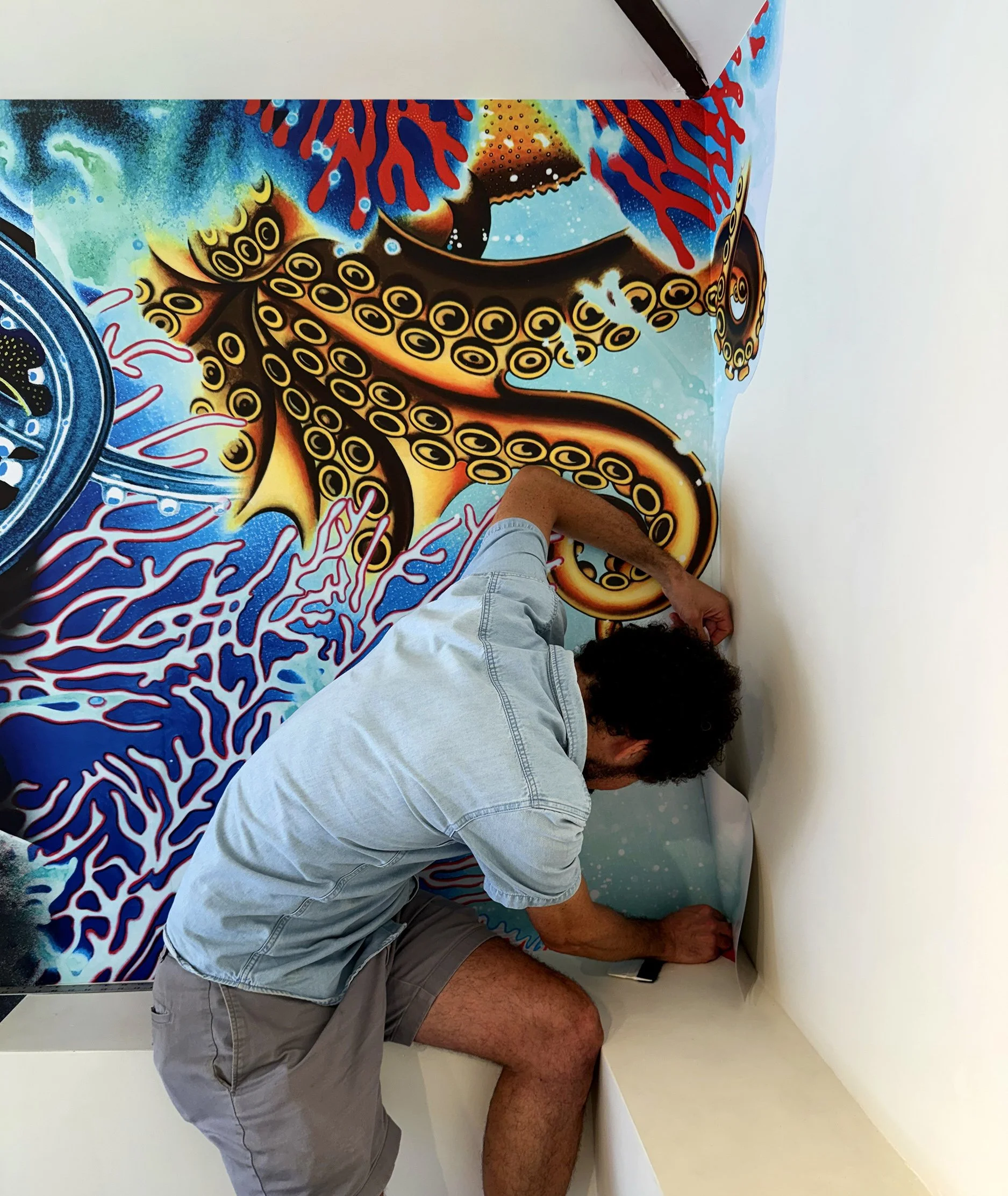 Topographies - Installation Process — Gerakaris installing ‘Topographies I’, one of two site-specific 20ft x 7ft wall murals at the Garage Art Center, NYC. Photo: Courtesy of the Garage Art Center. Currently on exhibition now thru 9/28