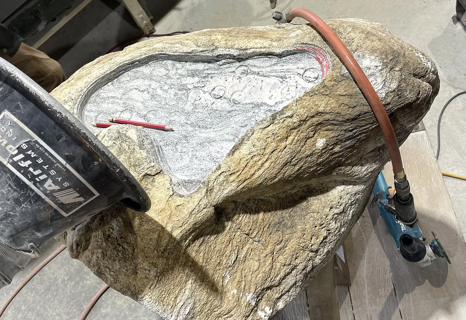   Preparing stone for Amur Falcon Mosaic Icon panel inlay at mason’s shop  