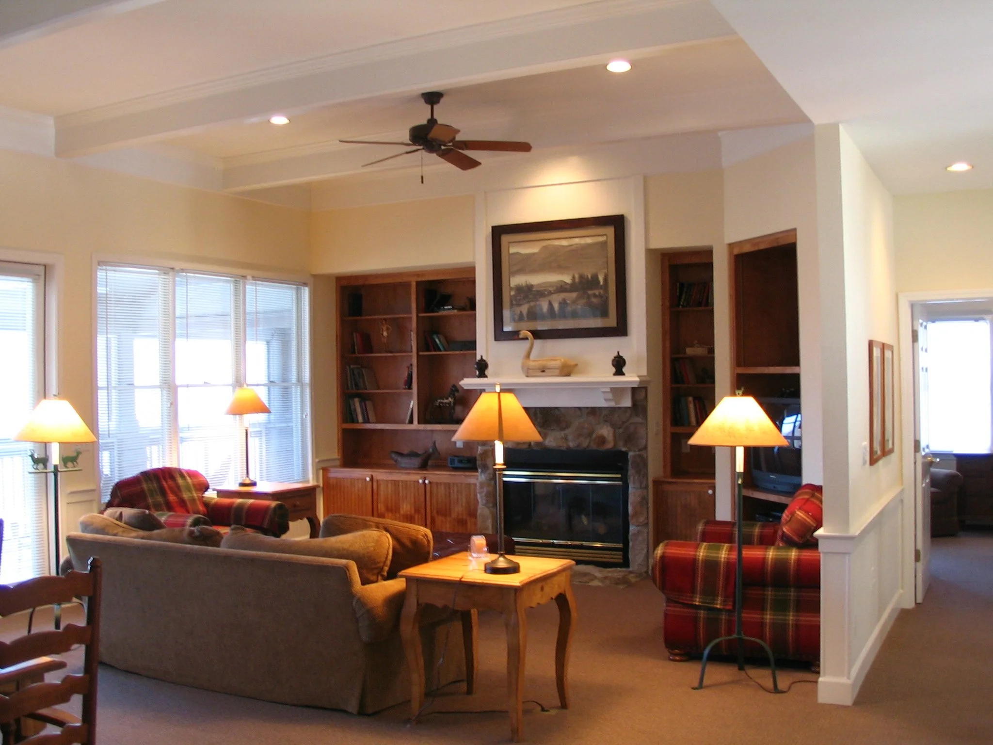 Living Area with View Windows and Porch Access