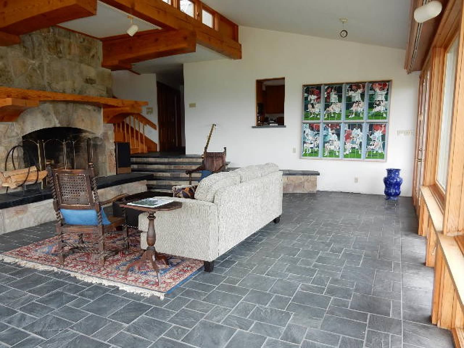 Main Floor Living Room with Stone Fireplace