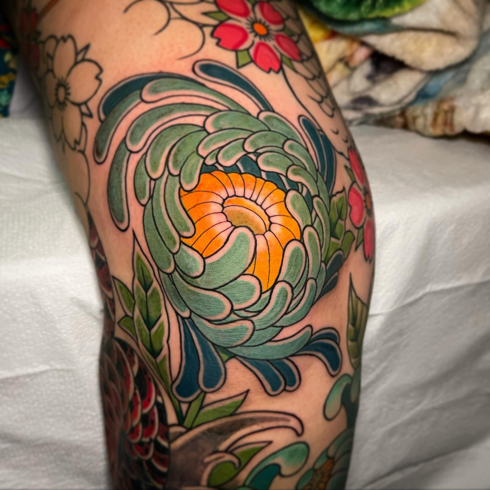Part of a big leg sleeve in progress!! So stoked!!!! 
.
.
#flower #flowertattoo #tattoo #tattoos #ink #inked #trad #colortattoo #art #artist #pain #sleeve #legsleeve #inkedgirl #inkedgirls #kneetattoo #kneecap #ftcollins #uw #co #colorado #laramie #w