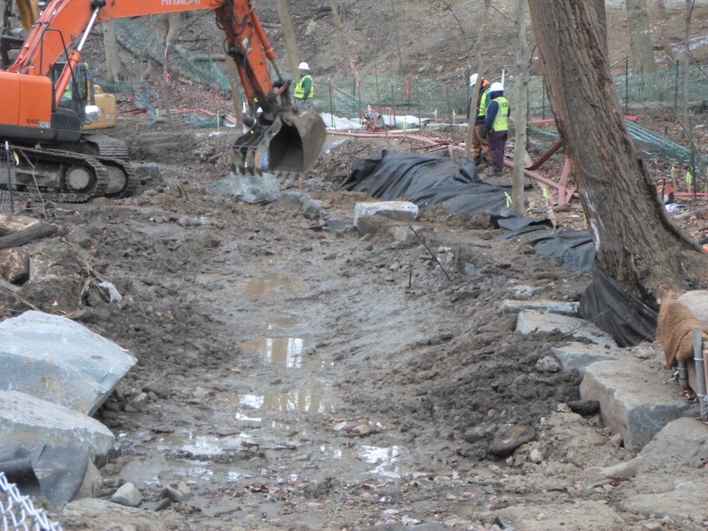 Excavating the new stream channel.