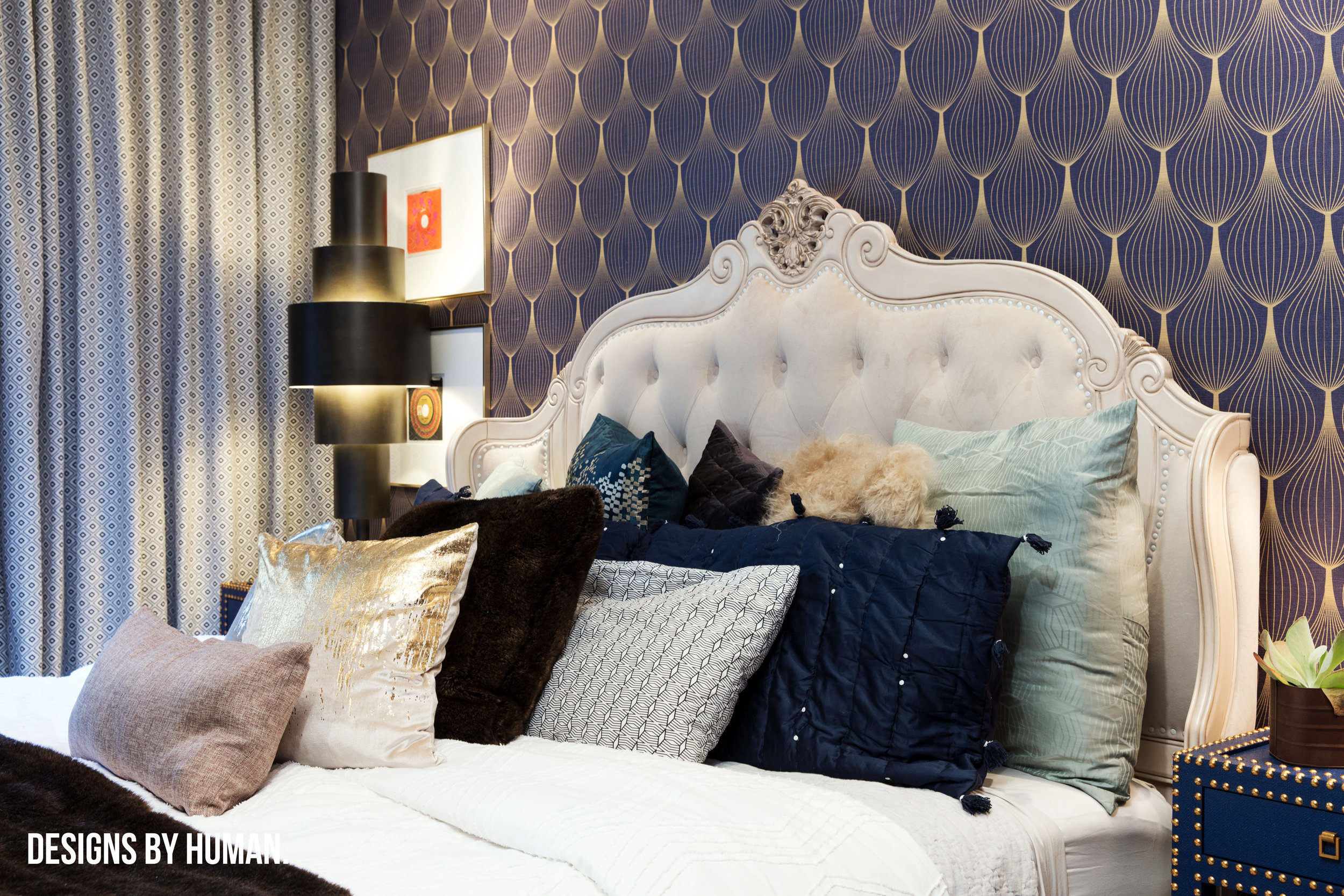 Bedroom - Palan Apartment by Designs By Human . This grande master bedroom features deep purple, blues, and browns - mixed with light tones of white, cream and beige.