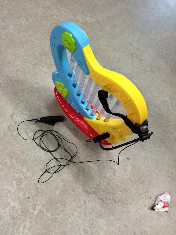 (This is how you prepare an $8 toy harp with a $500 contact microphone. Worth it? Yes.)