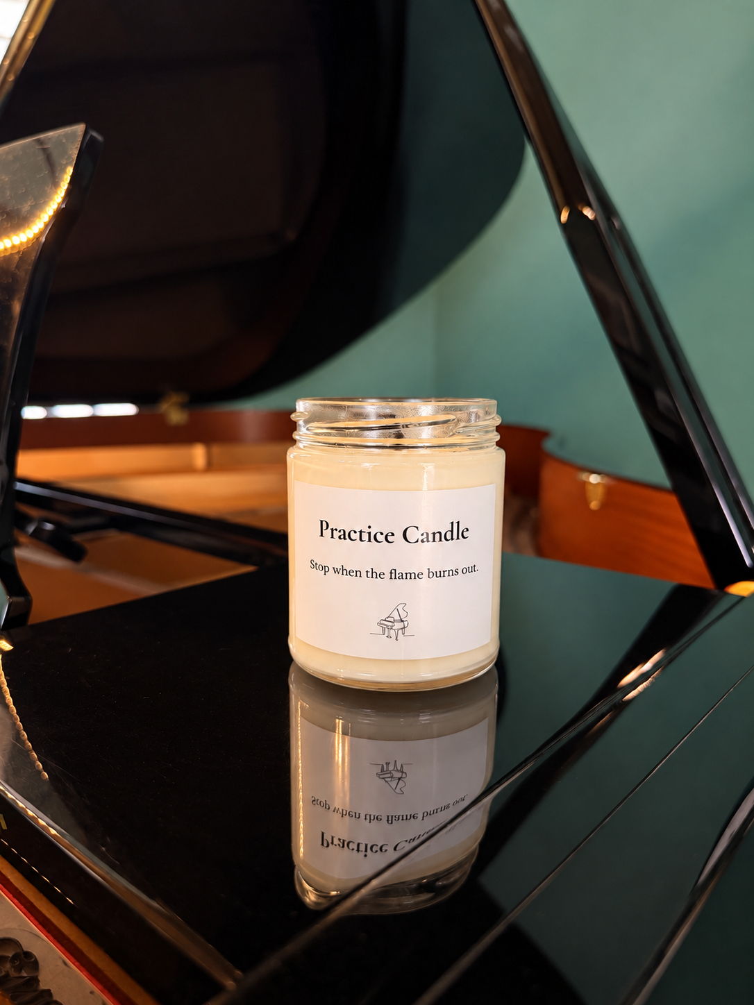 Candle on piano.PNG