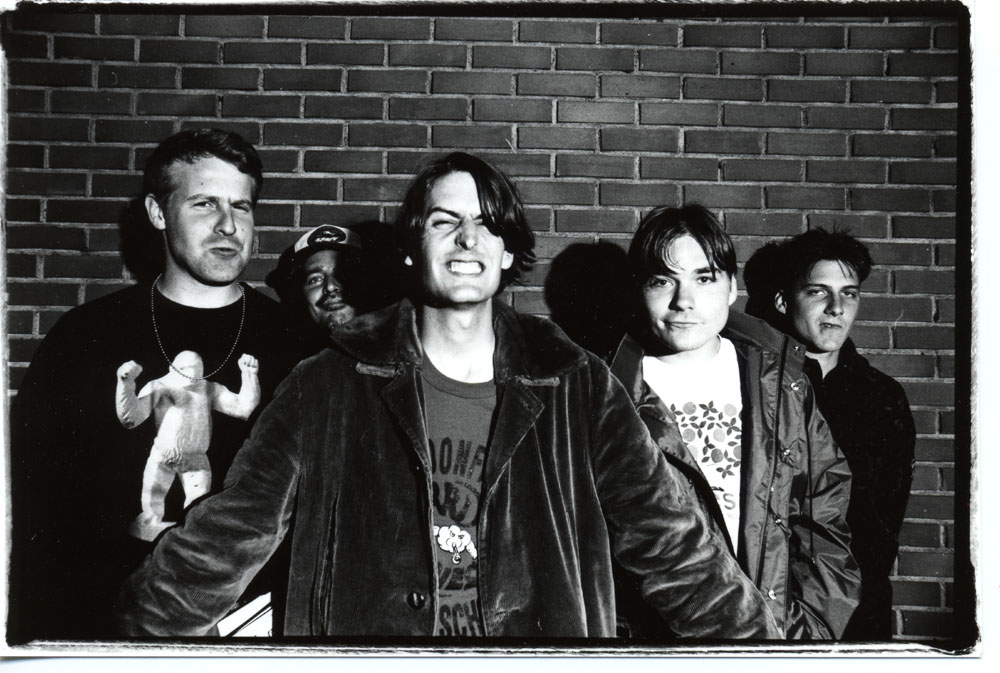 I couldn't find a photo of a band with a microwave. So here's a picture of Pavement, which seems like a band that knows its way around the electromagnetic spectrum.