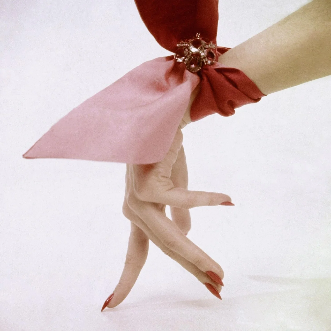 pink-wrist-scarf-photographed-by-clifford-coffin-in-1951.jpg