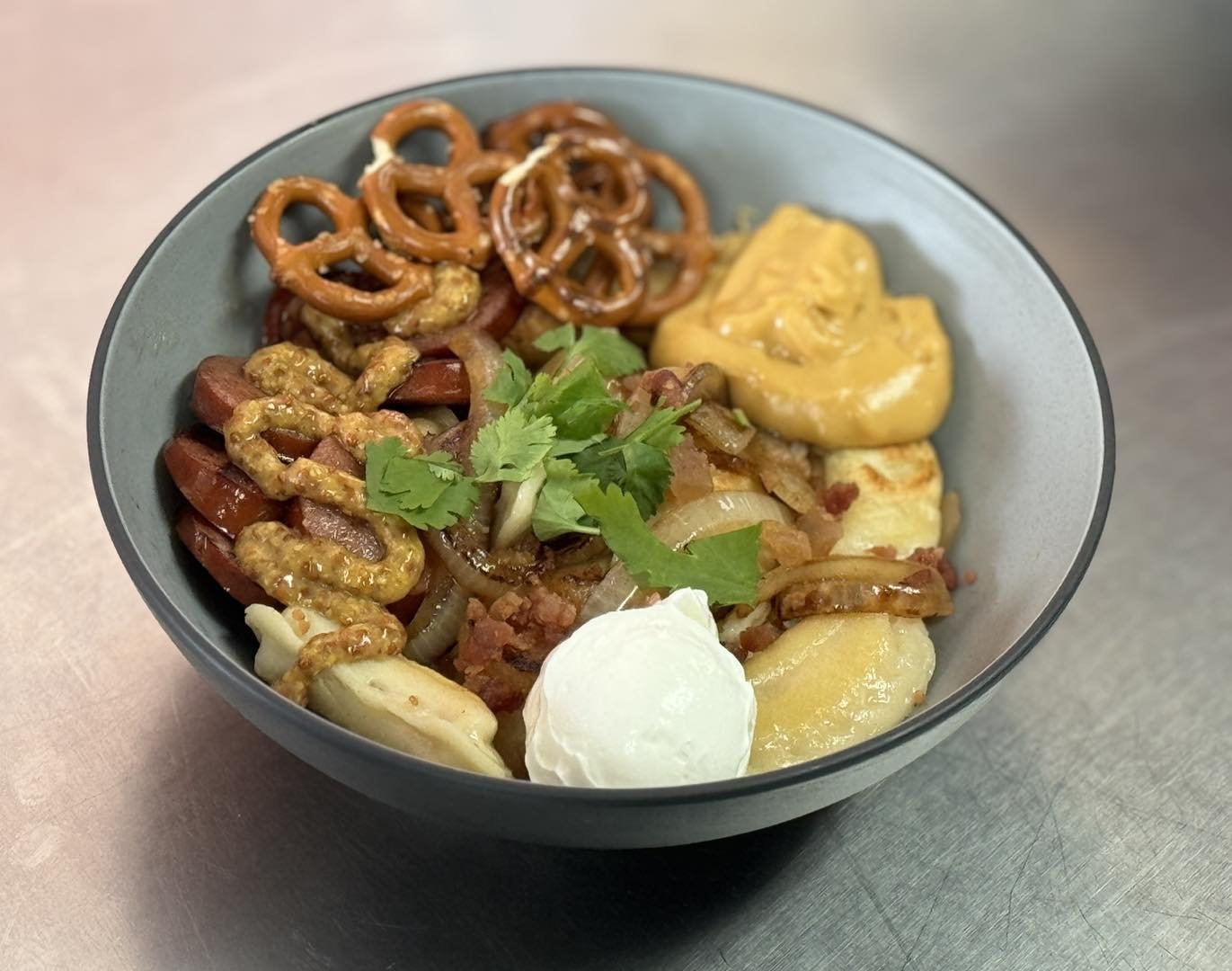 Oktoberfest is about to kick off at The Yard in Jonesboro and we&rsquo;ve been working on something very special for the event!🍻

Introducing our Oktoberfest style. Pan seared potato dumplings topped with caramelized onions, bacon bits, and house ma