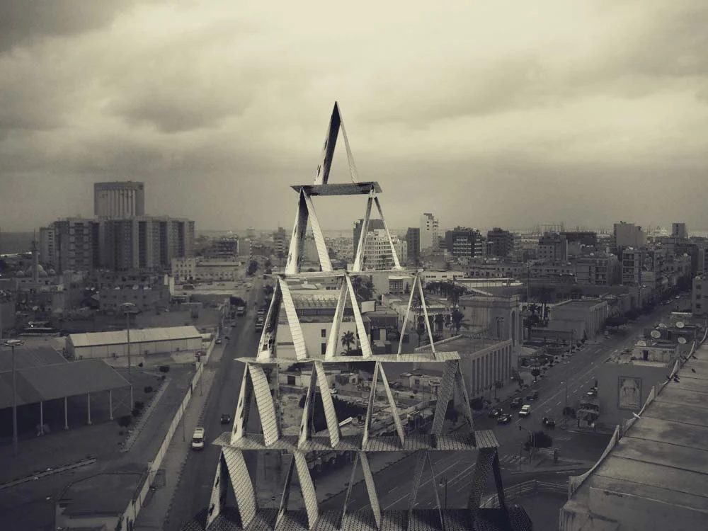 'Card Castle', 2007, Video Installation, variable dimensions Tripoli, Libya It is exactly the imbalance of two entities caused by a wearisome gravity that disturbs and shocks. The consequence is a scene detached from the reality, not of a fiction time.