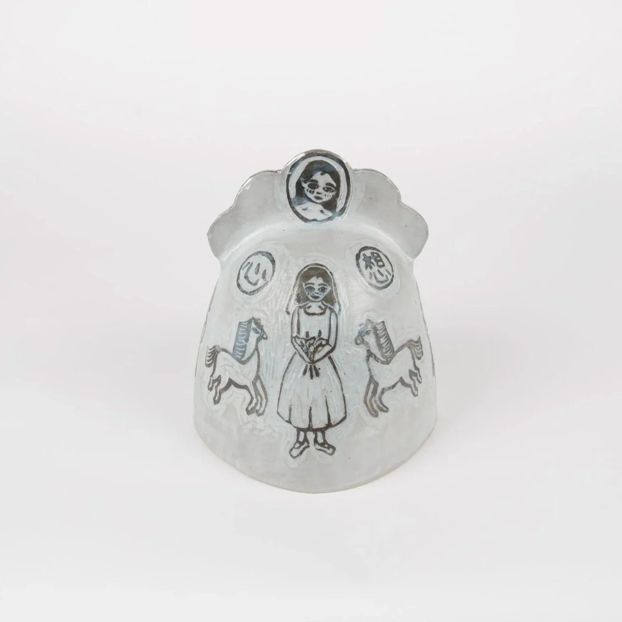 Wedding Bell, 2025, Block printed and carved ceramic bell, gas-fired with platinum luster, 8" x 7" x 7” (back)