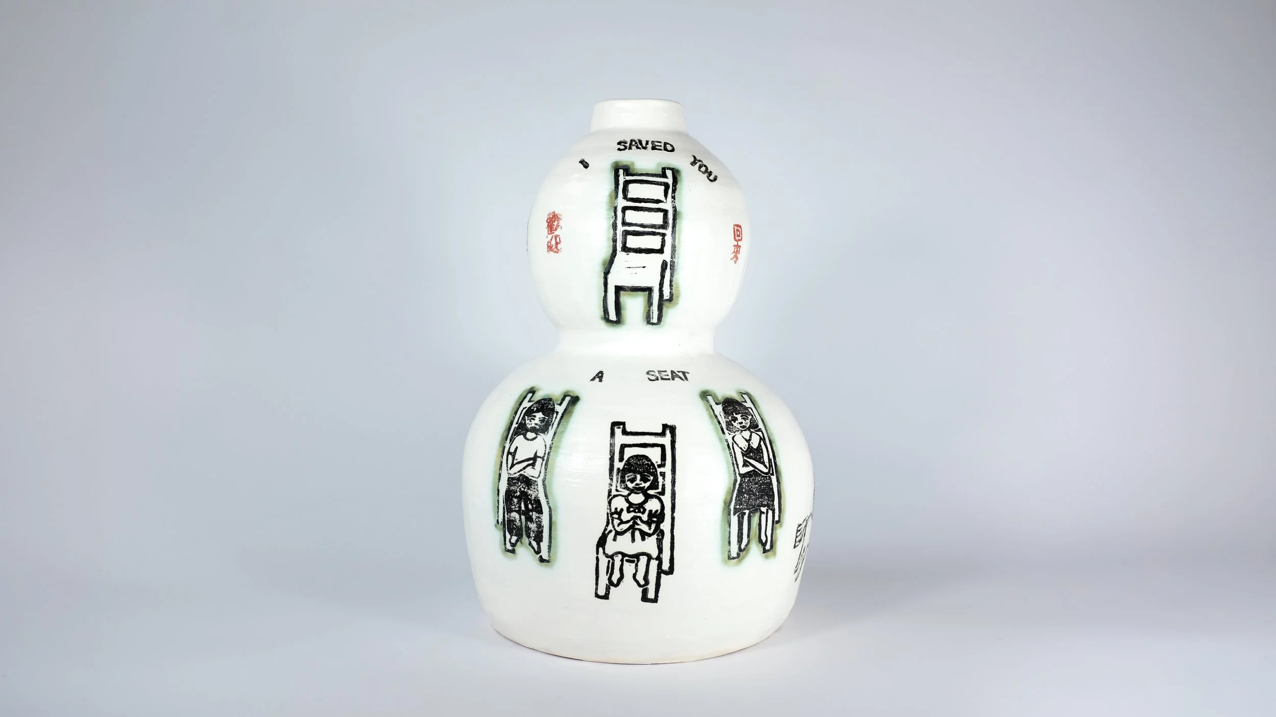July 1 (I Saved You a Seat), 2026, Block print underglaze, copper carbonate, on porcelain slip and terracotta, 8" x 8" x 12"