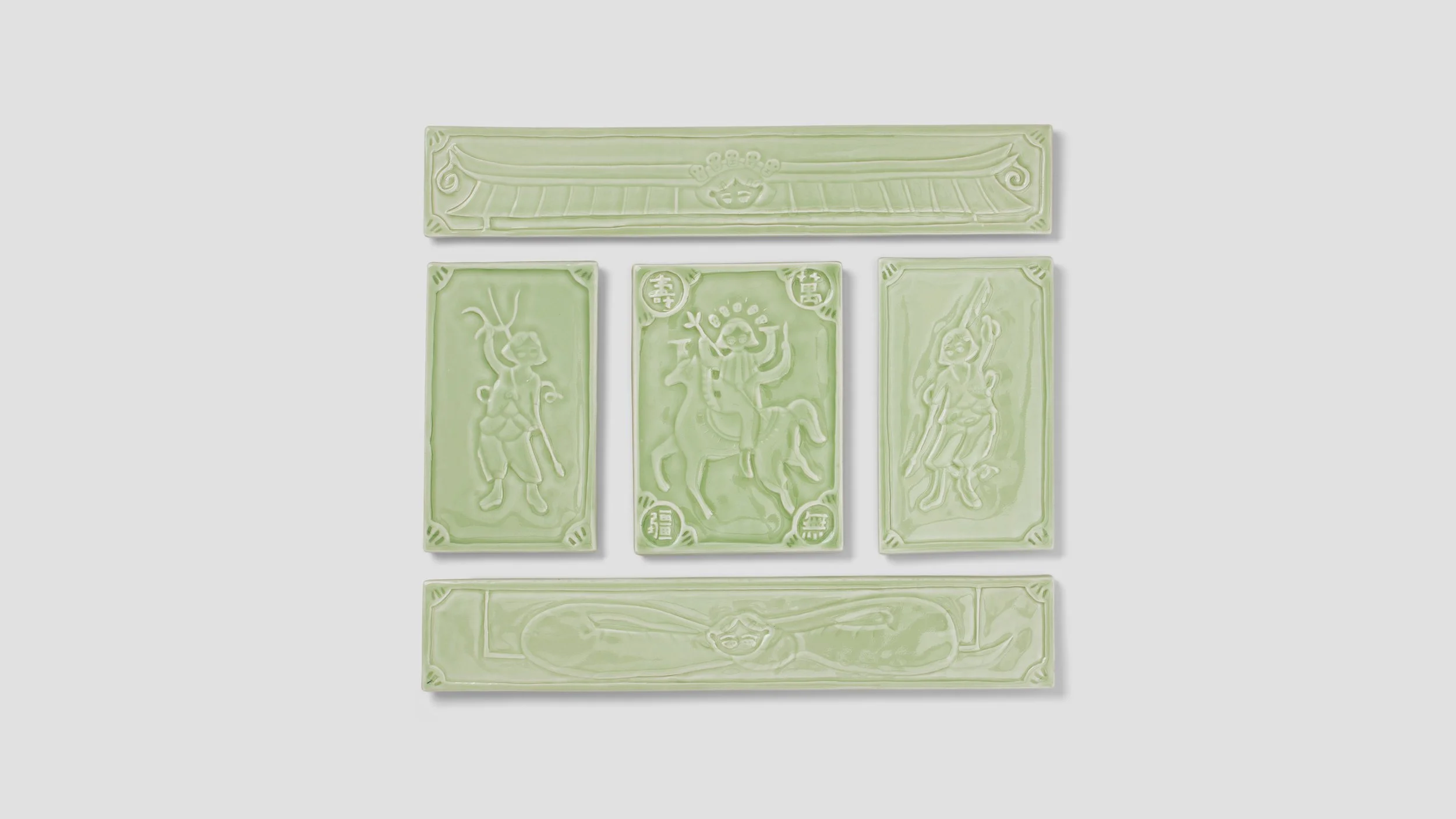 Protection, 2023, Carved porcelain tile with celadon glaze, 20” x 18”