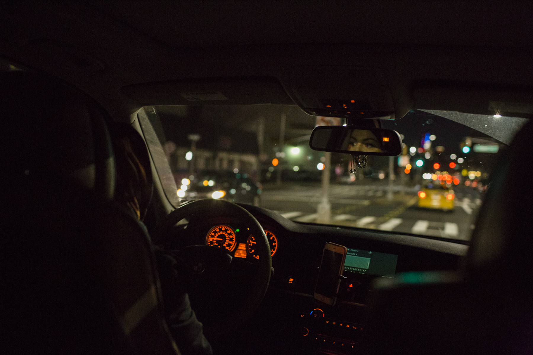 Quhshi driving herself and her second cousin home to Brooklyn after a long day at the salon. It's unusual for Yemeni American female immigrants from rural regions of Yemen to be out after dark.