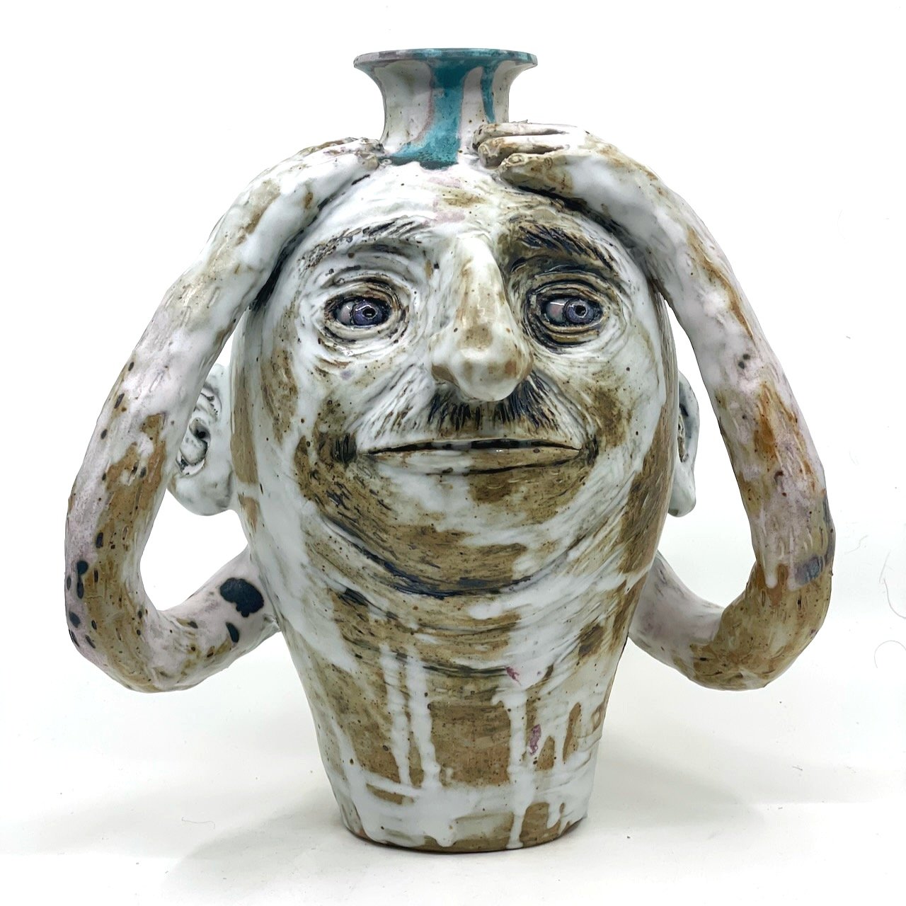 Drippy white vase with a face and arms
11 x 10 x 8
2025
$