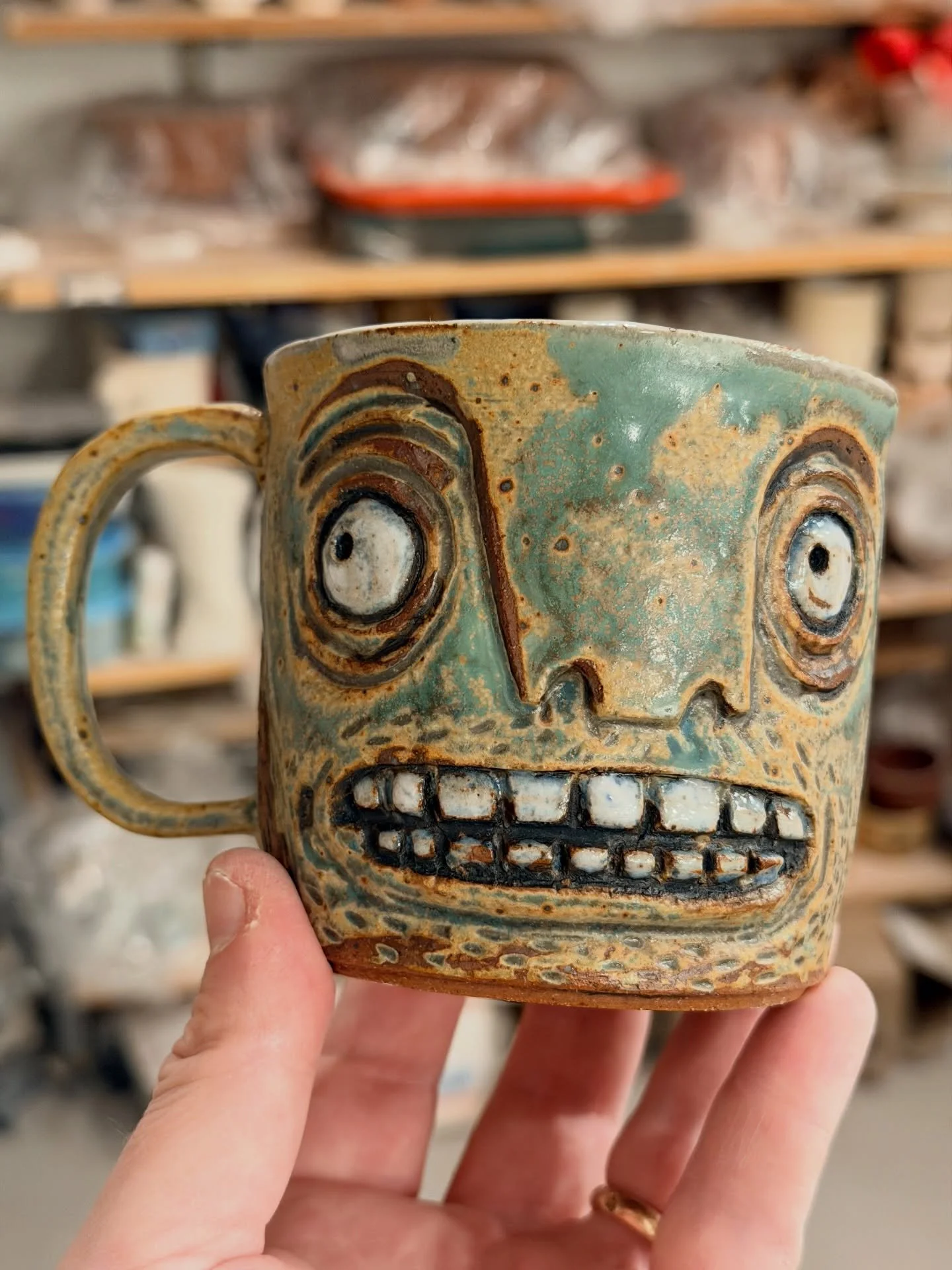 Mug accidentally dropping a mug. Mug is me. I am always accidentally dropping mugs.