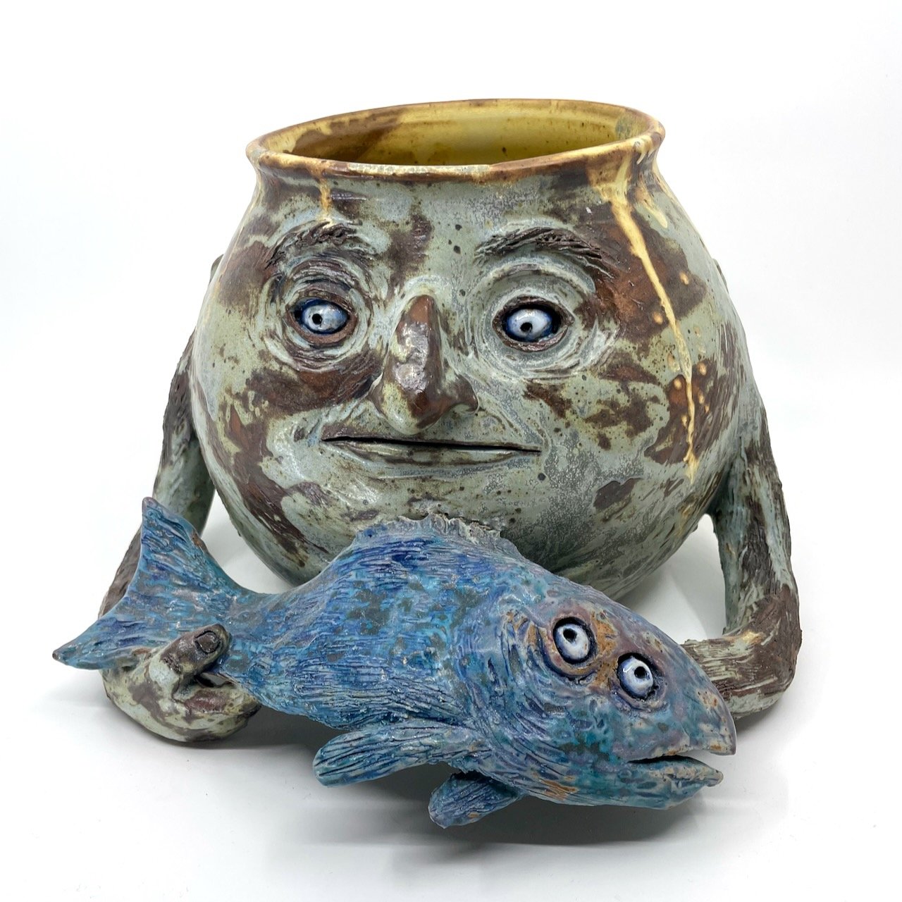 Vessel with a fish
7 x 11 x 9
2025
$