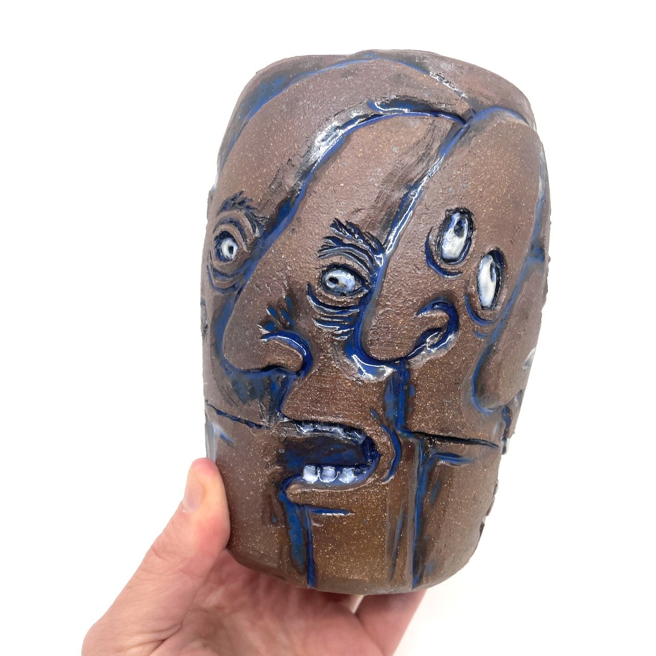 Vase with faces and faces and faces
6.5 x 4.5 x 4.5
2025
$