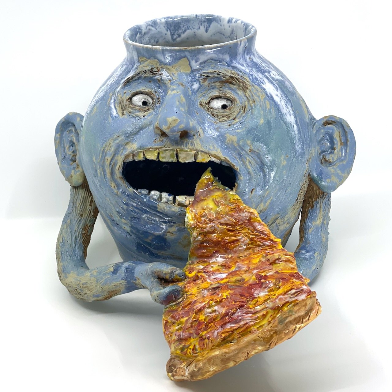 Vase eating pizza
8.5 x 14 x 10
2025
$