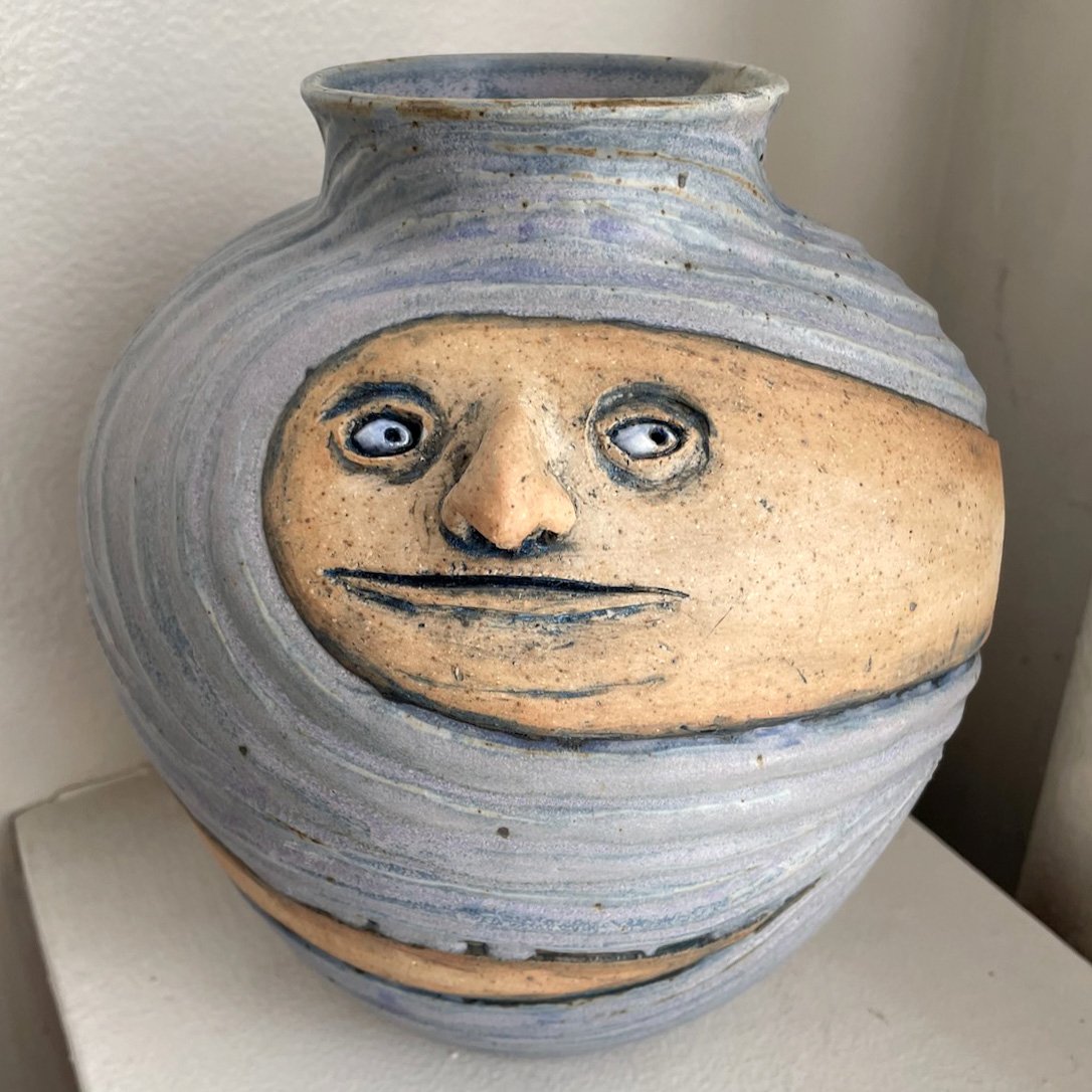 Snake with a face vase
9x8x8
2025
$