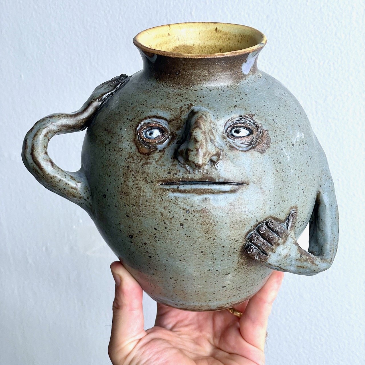 Vase with a hand on its forehead
7 x 7 x 6
2025
$