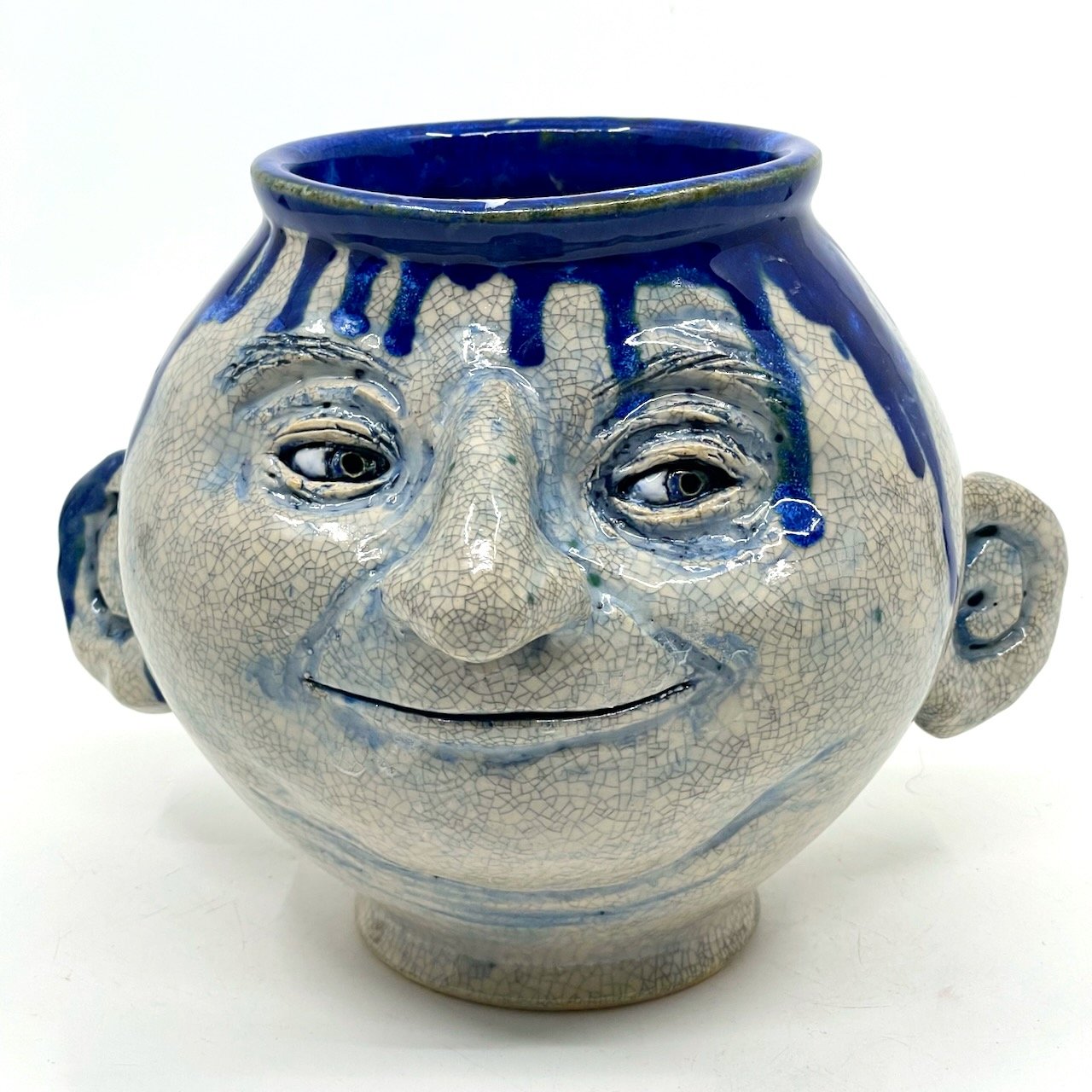 Slightly smug vessel with blue drips.
6.5x8x7
2025
$