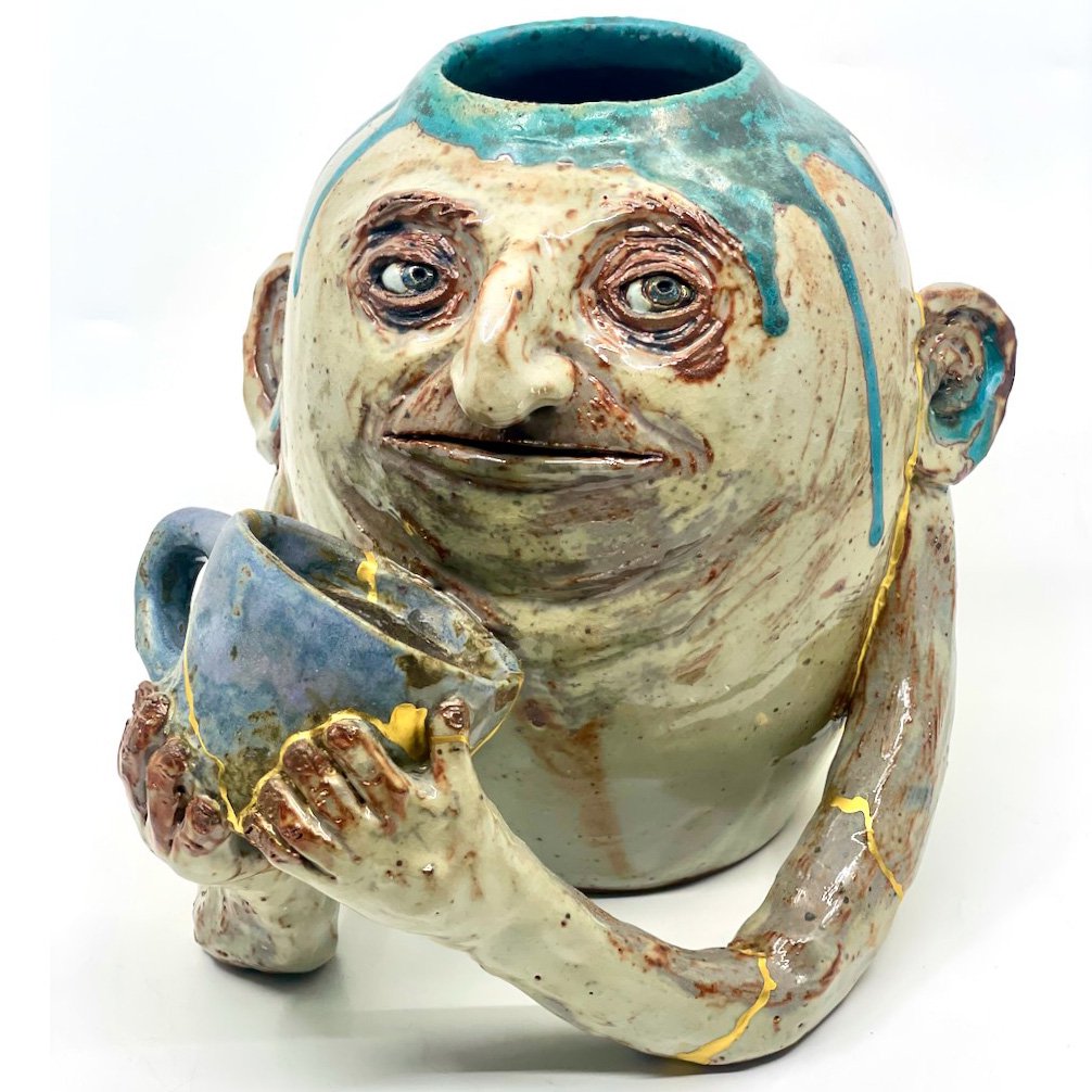 Vase holding mug (kintsugi repairs by Yuko Gunji)
8.5x10x8
2025
$